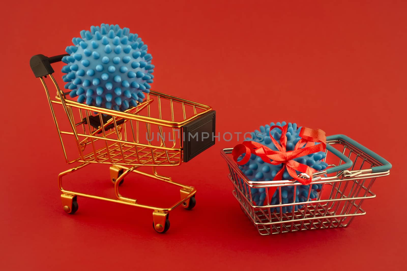 Virus molecule on a shopping cart and basket conceptual of the possibility of infection with corona virus or Covid-19 over a red background