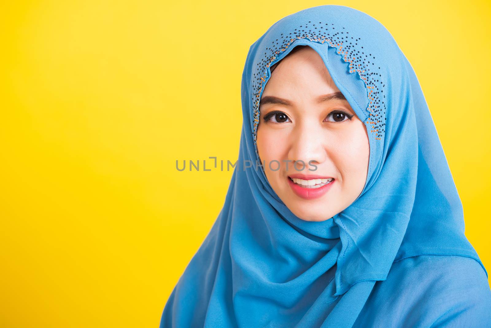 Woman Islamic religious wear veil hijab she smiling by Sorapop