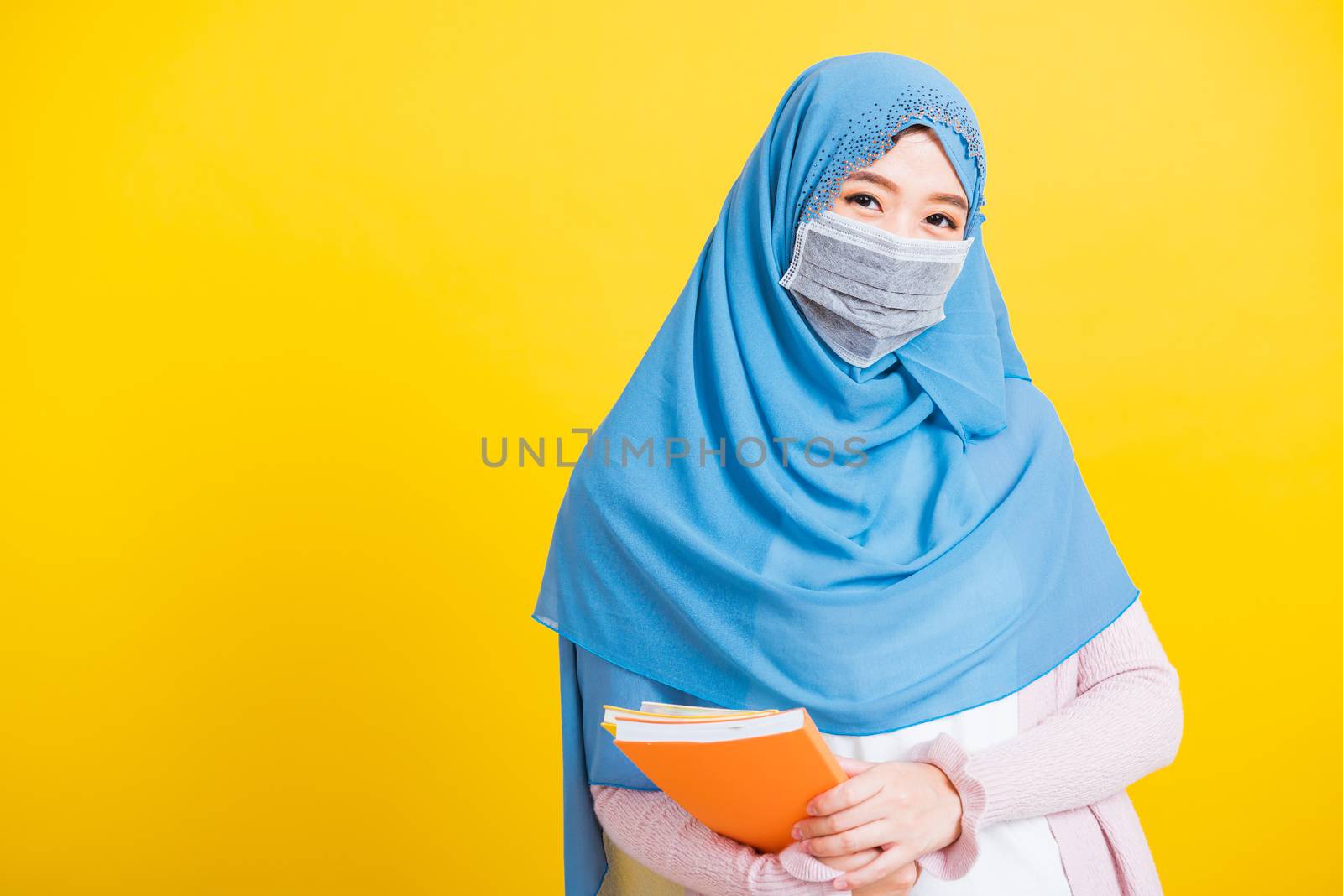 Woman religious wear veil hijab and face mask protective to prev by Sorapop