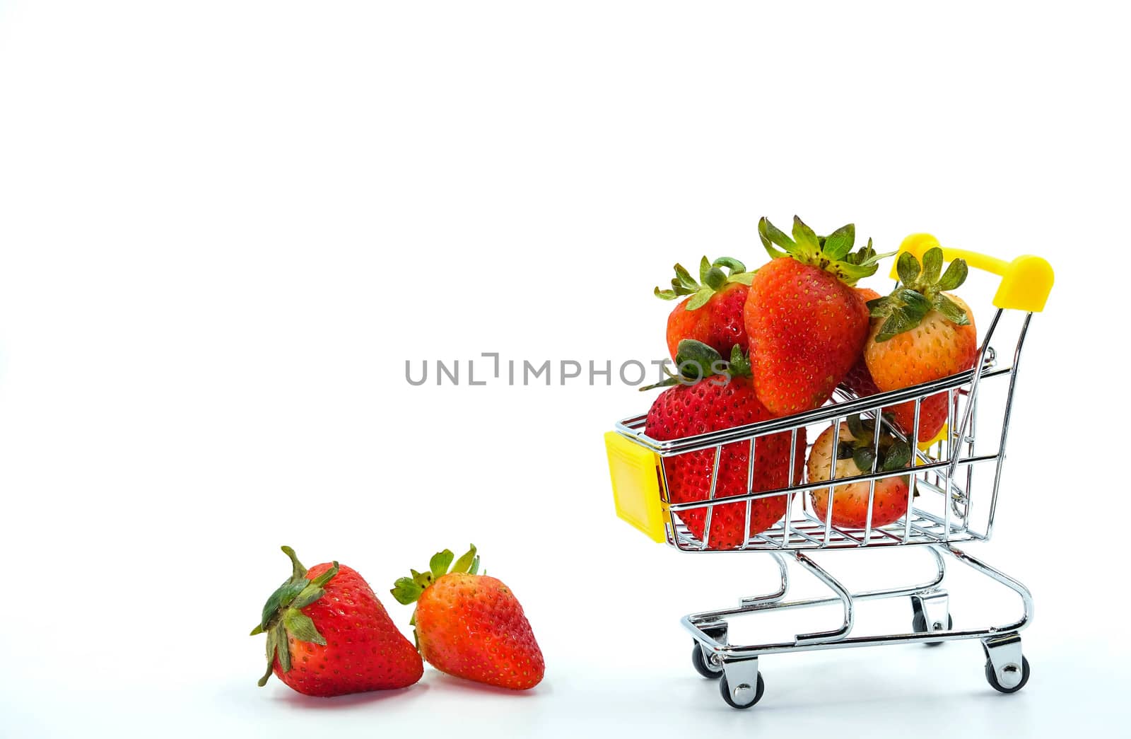 Close up strawberry on shopping cart isolatd on White Background