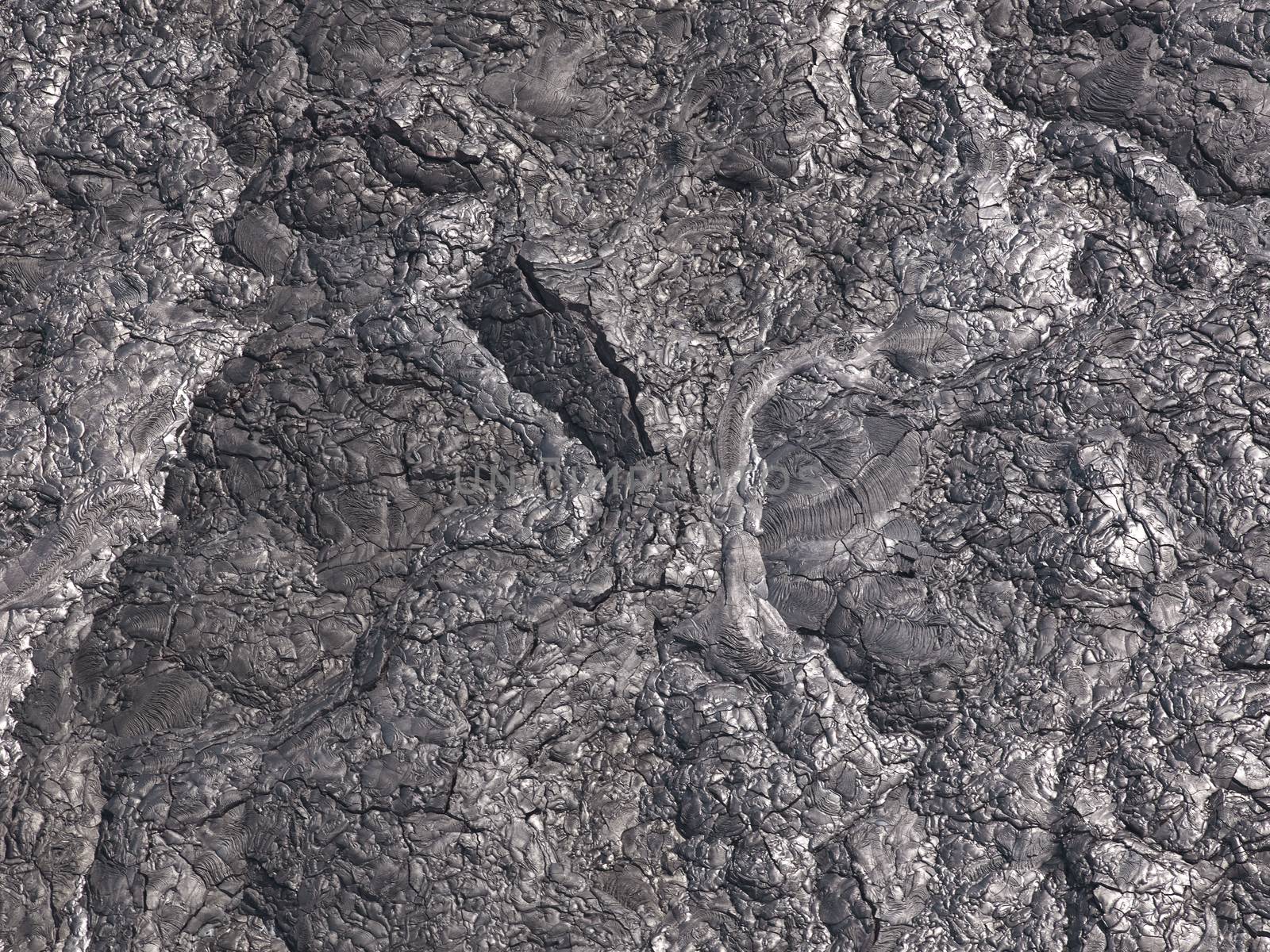 Patterns Cracks And Shapes From Close Up Portion Of Black Solidified Lava, Hawaii