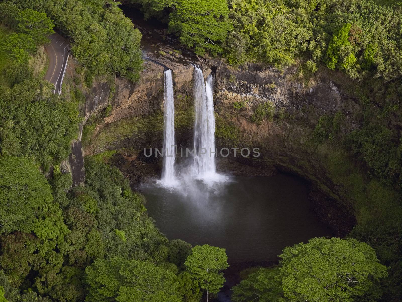 Aerial View Of A Waterfall In Kauai, Hawaii by dani3315