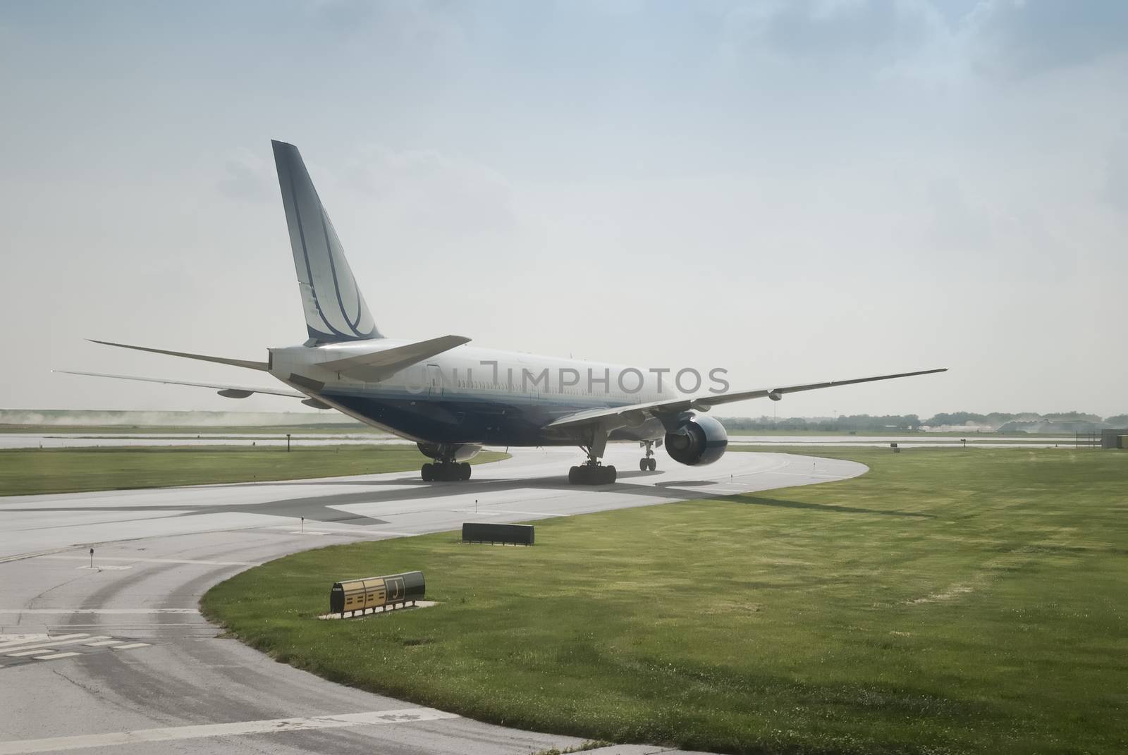 Double Engine Passenger Private Jet Landing On A Clear Blue Sky by dani3315