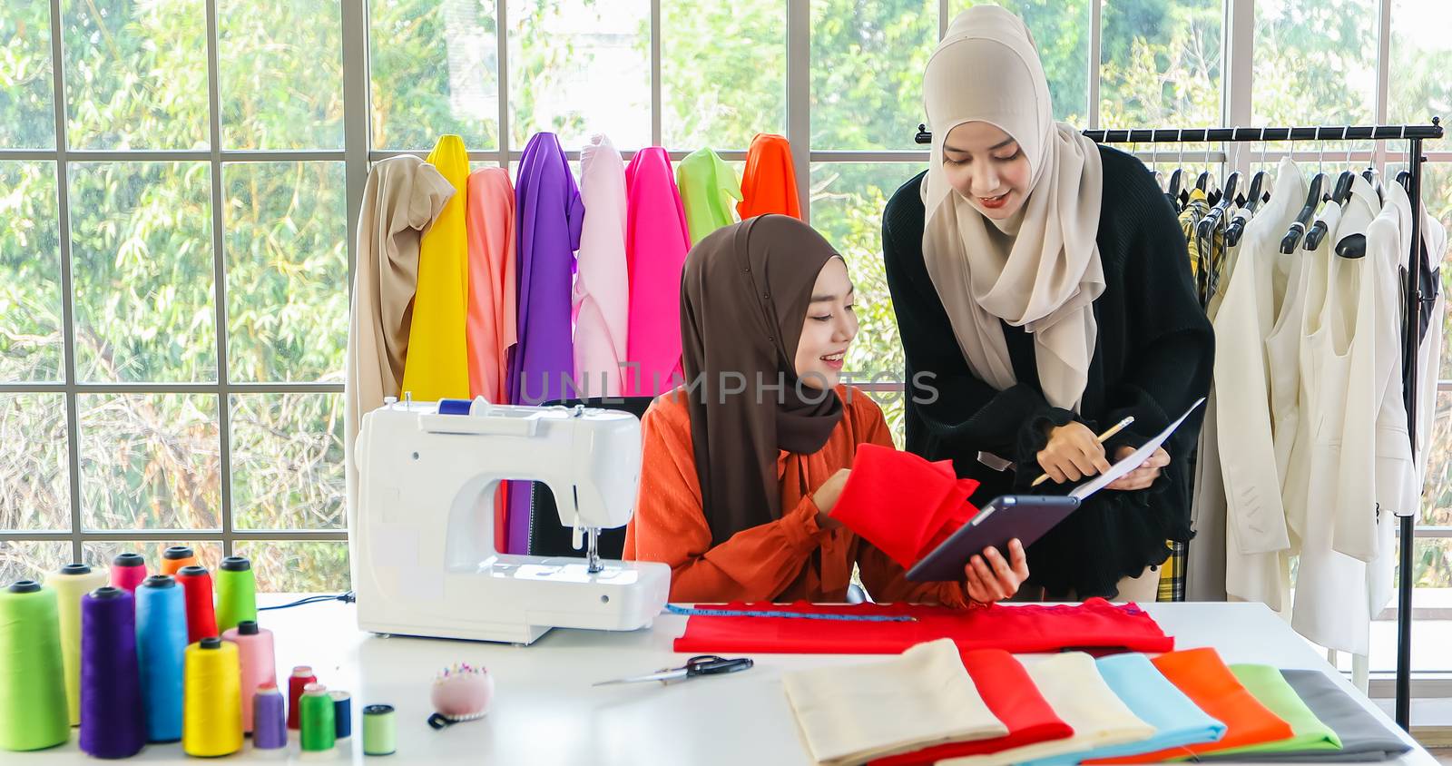 Small business of Muslim woman fashion designer Working and  usi by Tuiphotoengineer