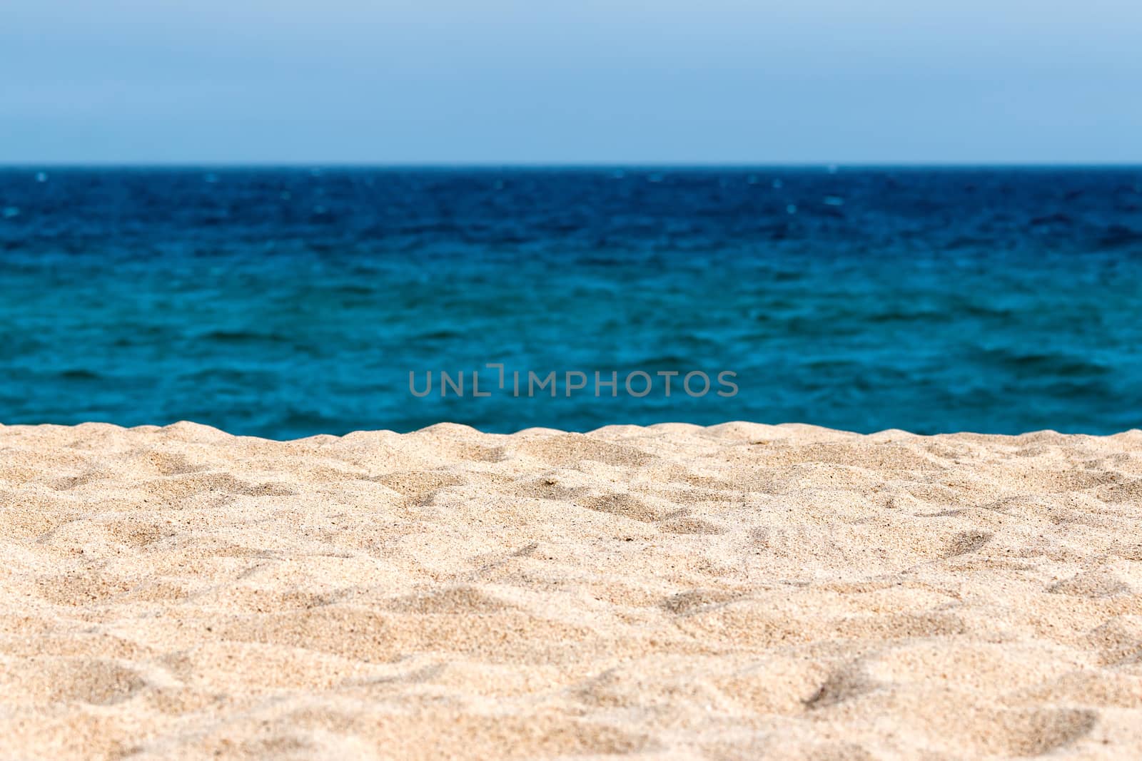 Idyllic sand beach background. 