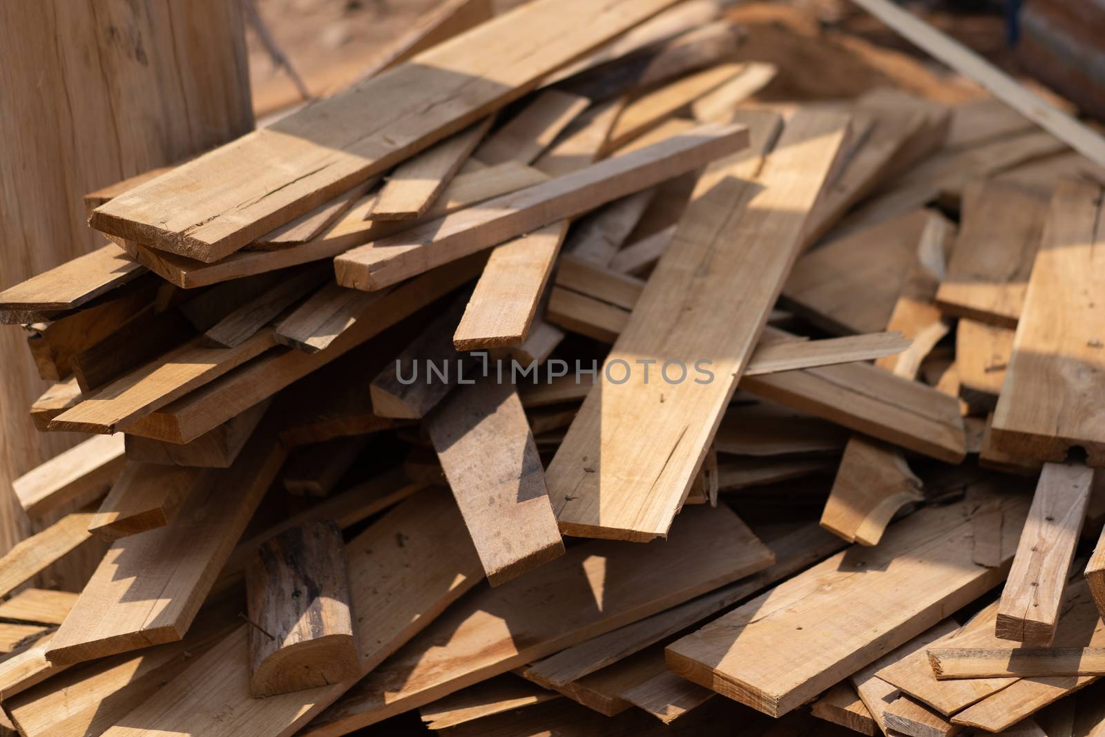 The wood was stacked on the floor. by JCStock
