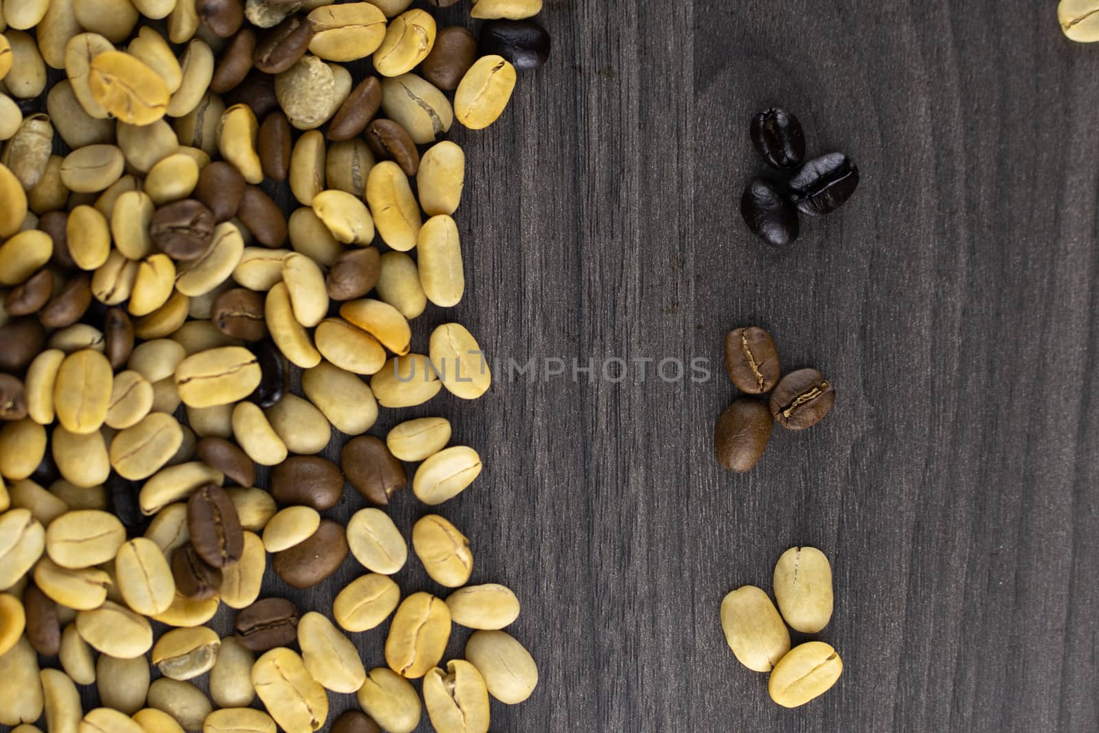 Striped coffee beans isolated in a wooden background