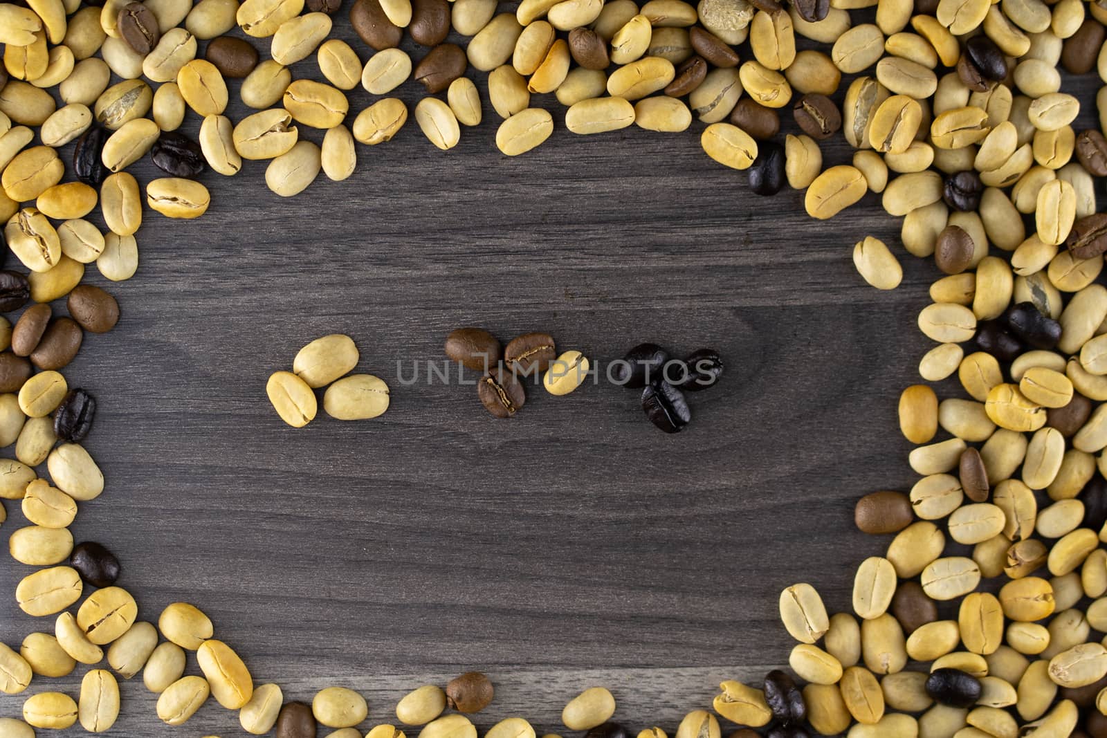 Striped coffee beans isolated in a wooden background