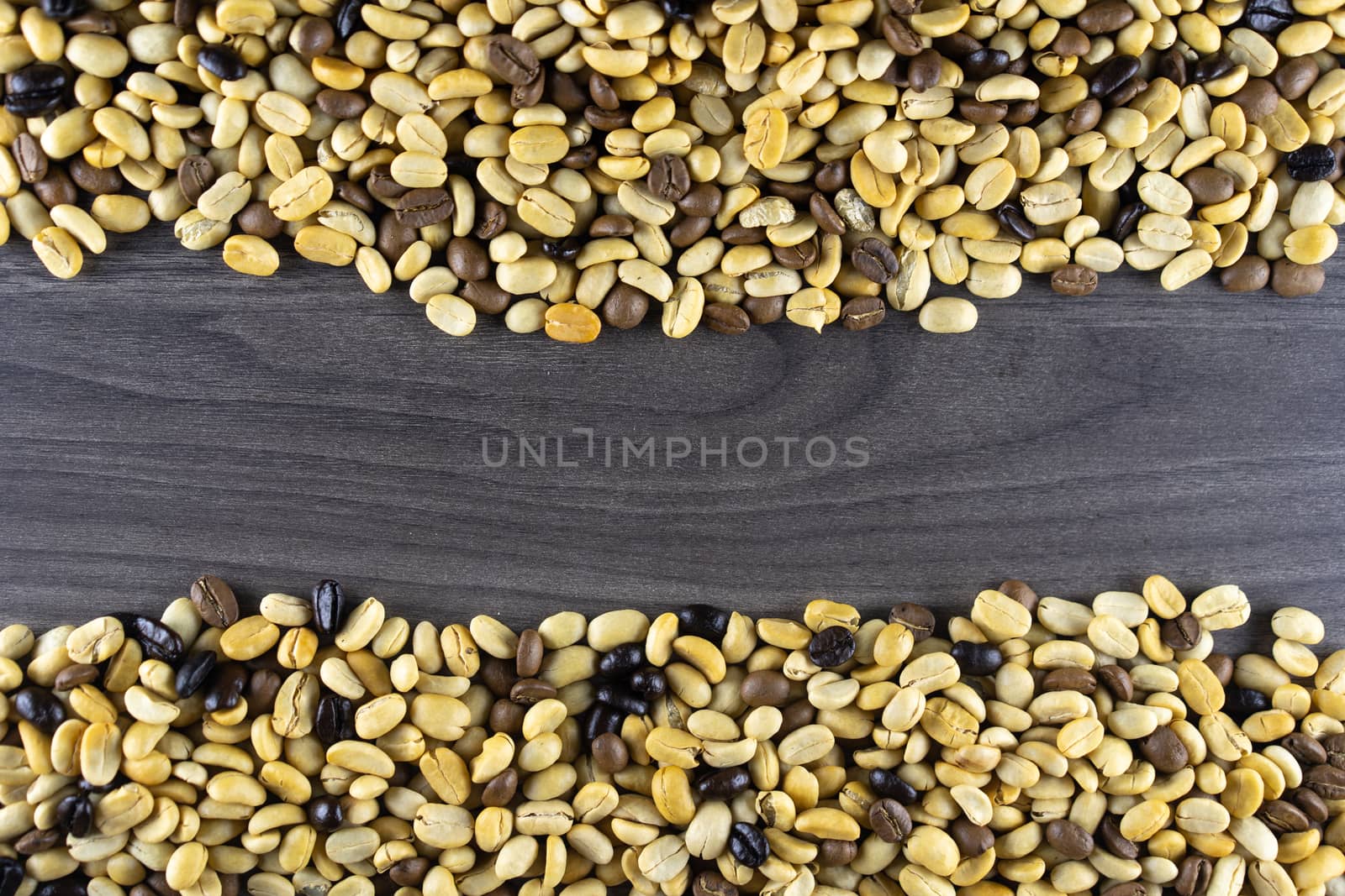 Striped coffee beans isolated in a wooden background