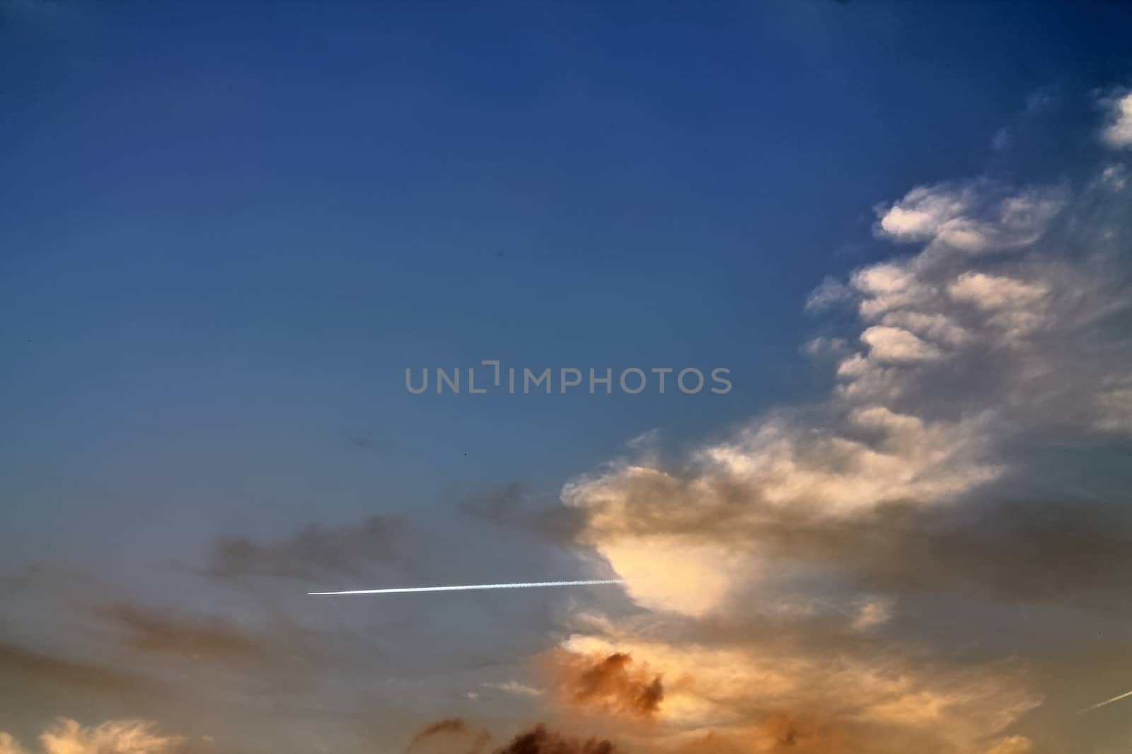 Beautiful panorama of orange and yellow clouds at sunrise by MP_foto71