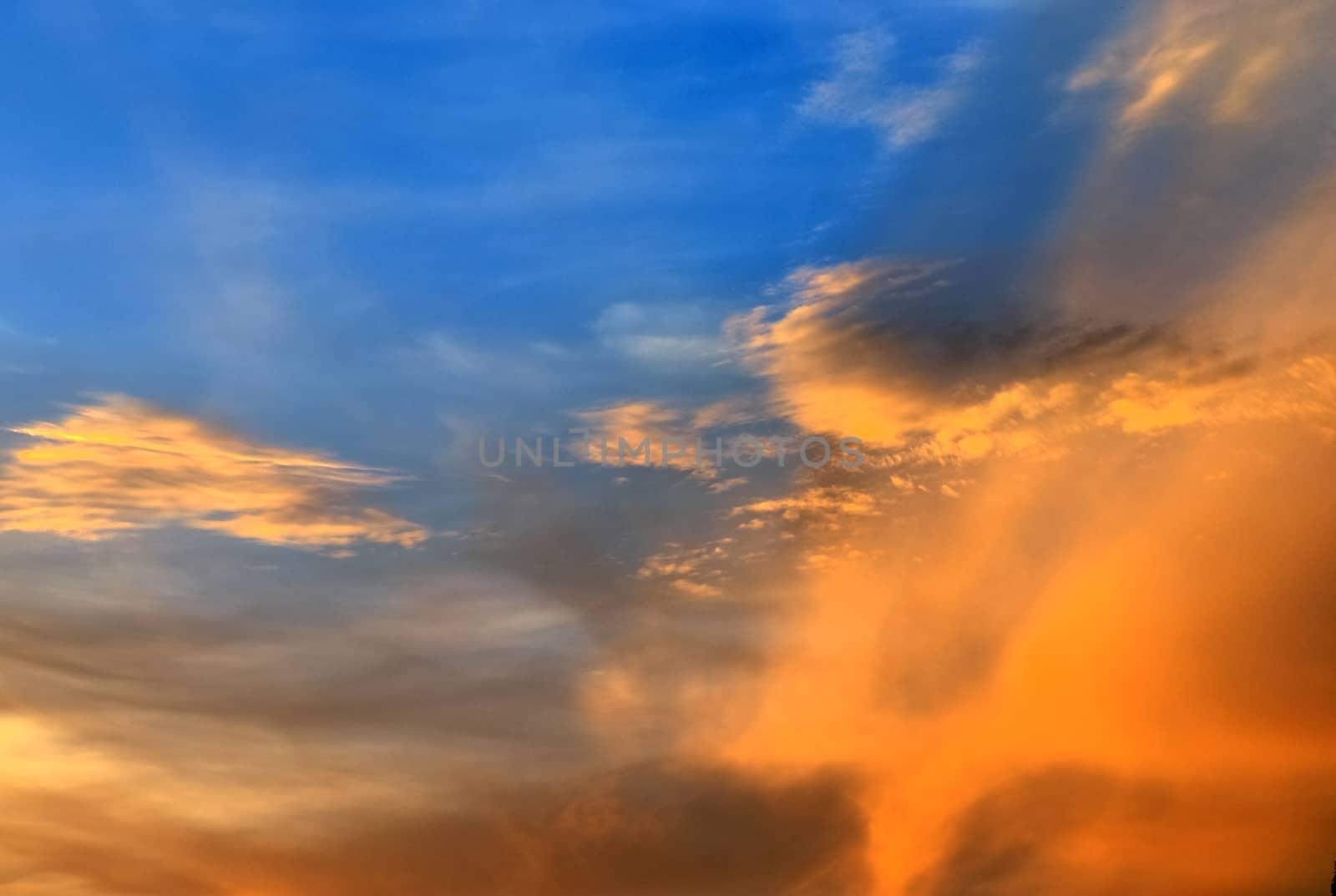 Beautiful panorama of orange and yellow clouds at sunrise by MP_foto71