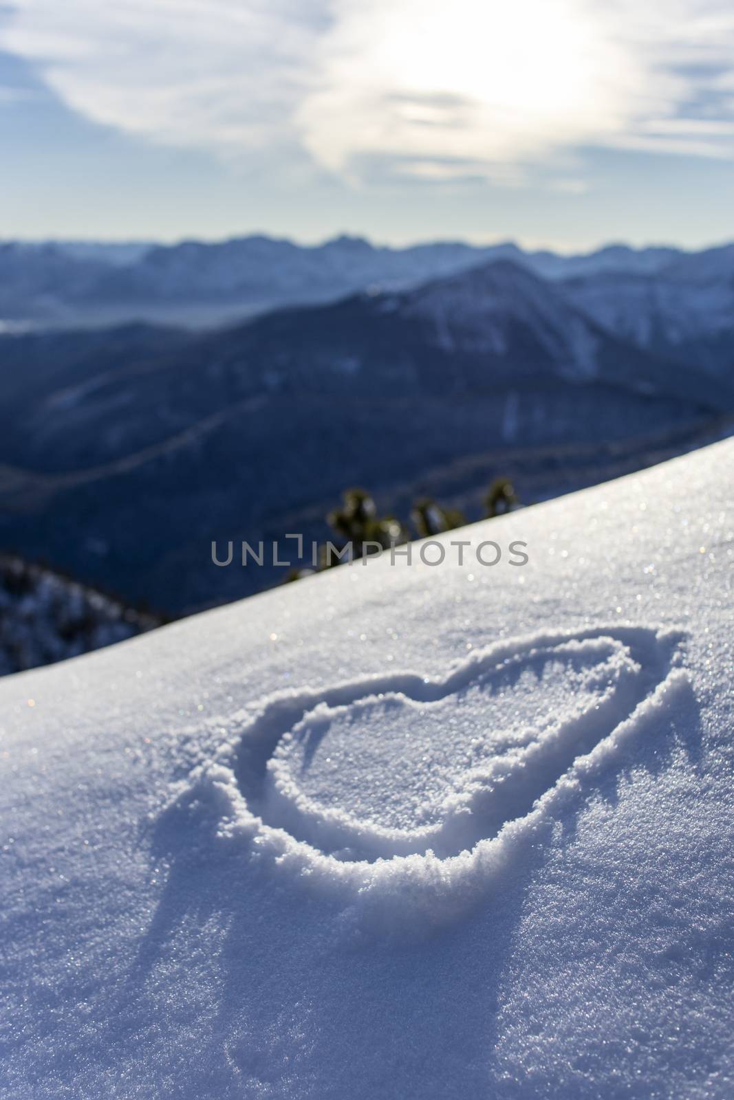 heart drawn in the fresh snow