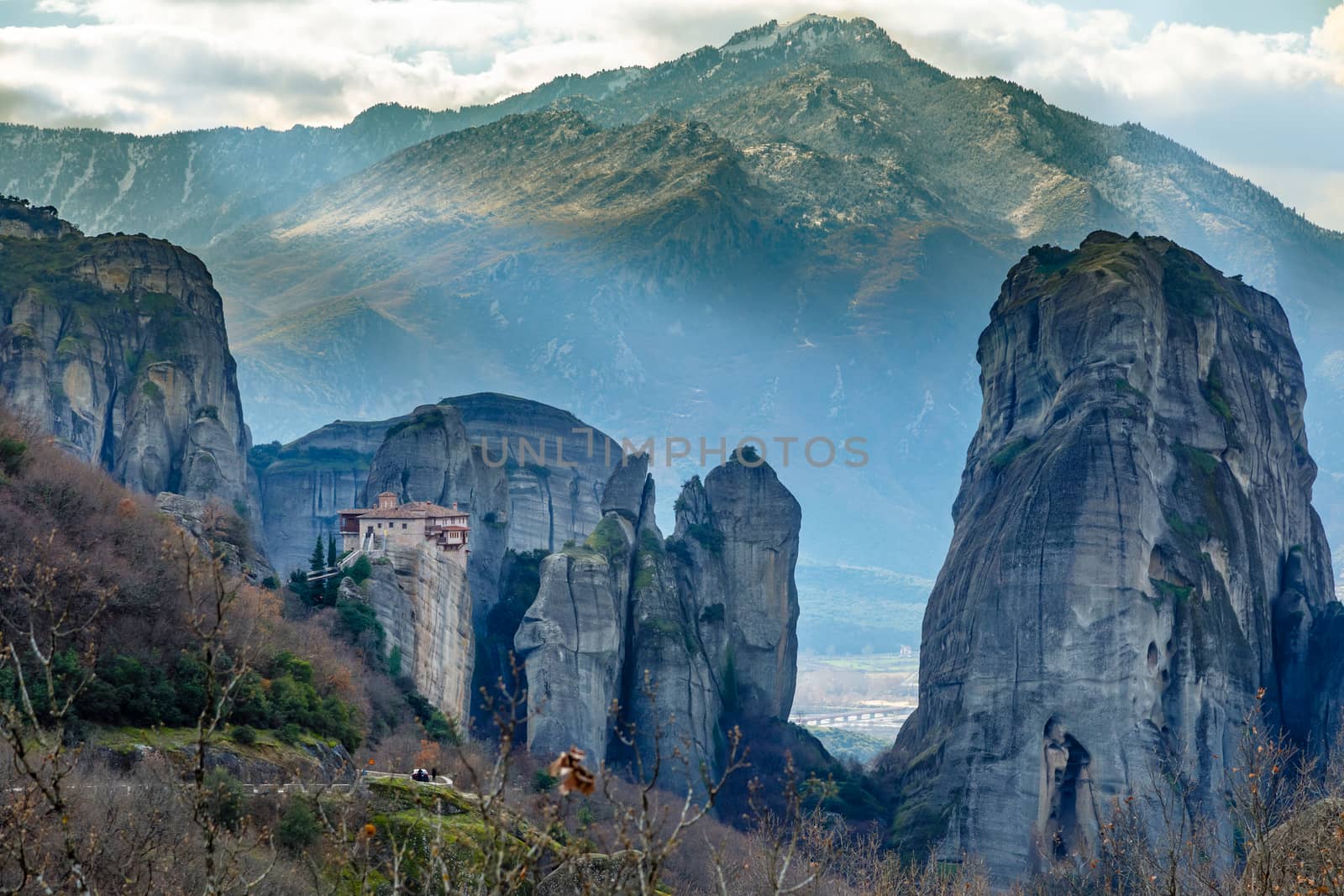 The Holy Monastery of Roussanou among the steep cliffs, mountains panorama, Kalampaka, Trikala, Thessaly, Greece