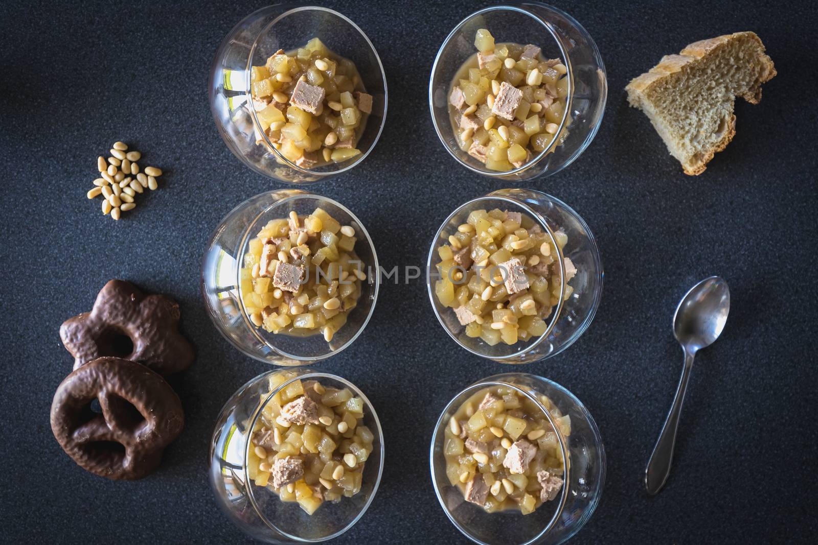 Verrine of pear foie gras and pine nuts in French cuisine