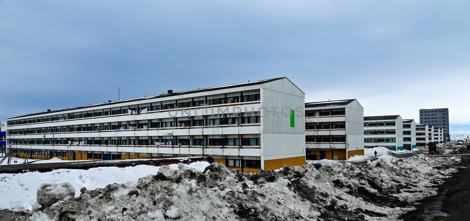 Dull rows of long Inuit living buildings in Arctic capital Nuuk city, Greenland