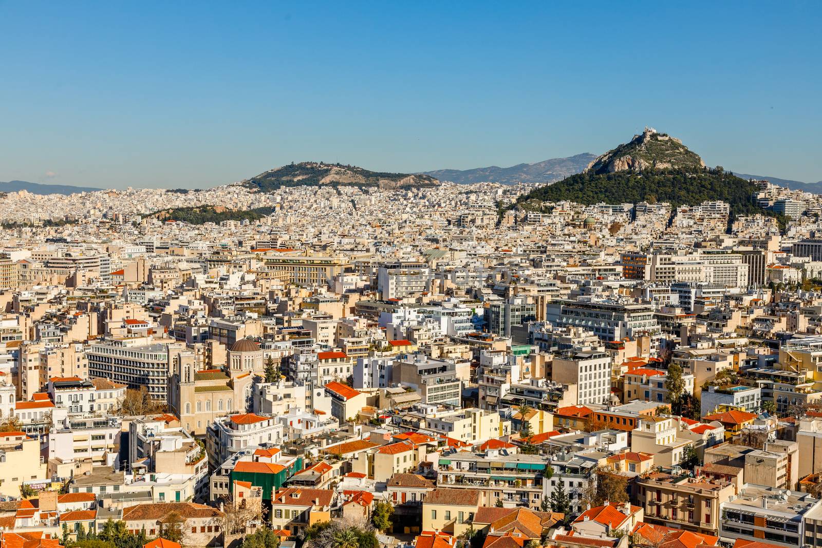 Central part of modern Athens city speaded among the hills to the horizon, Attica, Greece