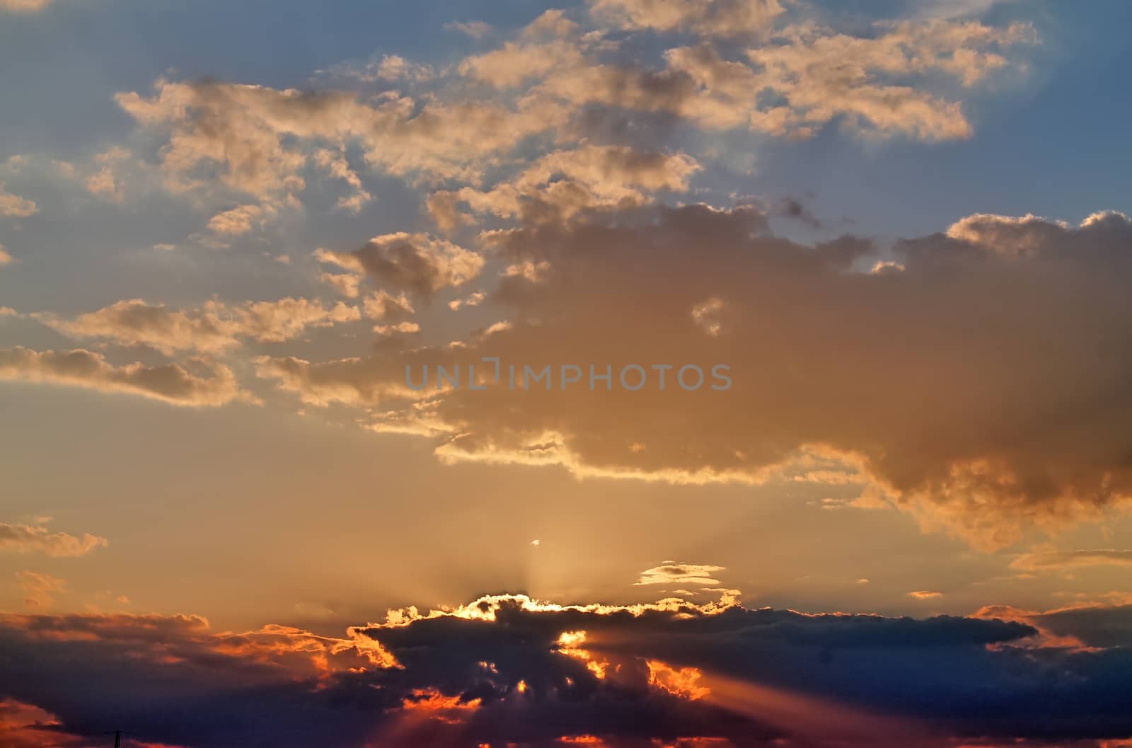 Beautiful view at sunbeams with some lens flares and clouds in a by MP_foto71