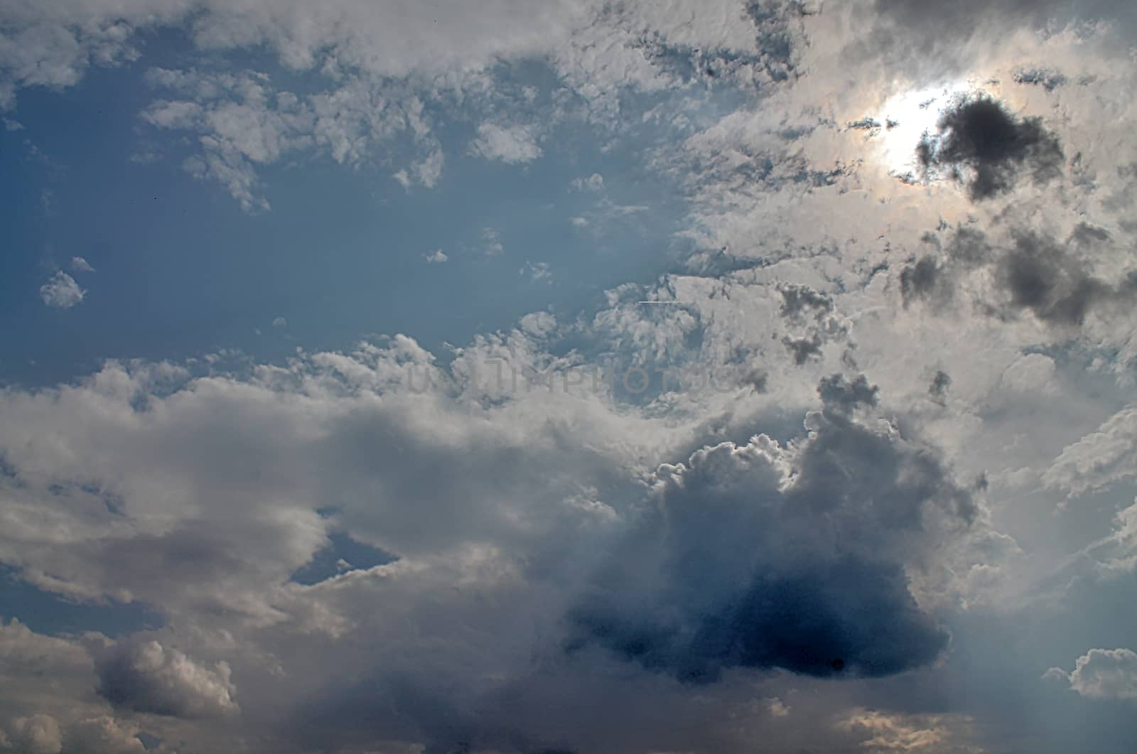 Beautiful view at sunbeams with some lens flares and clouds in a by MP_foto71