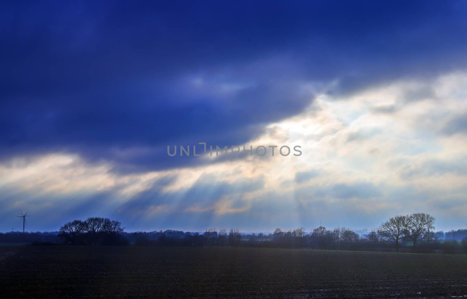 Beautiful view at sunbeams with some lens flares and clouds in a by MP_foto71