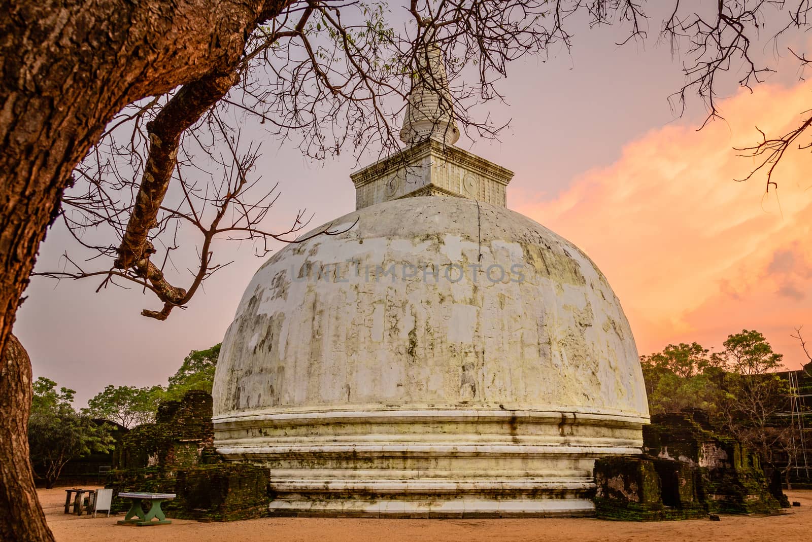 Kiri Vehere old buddhist stupa temple at sunset time, Polonnaruw by ambeon