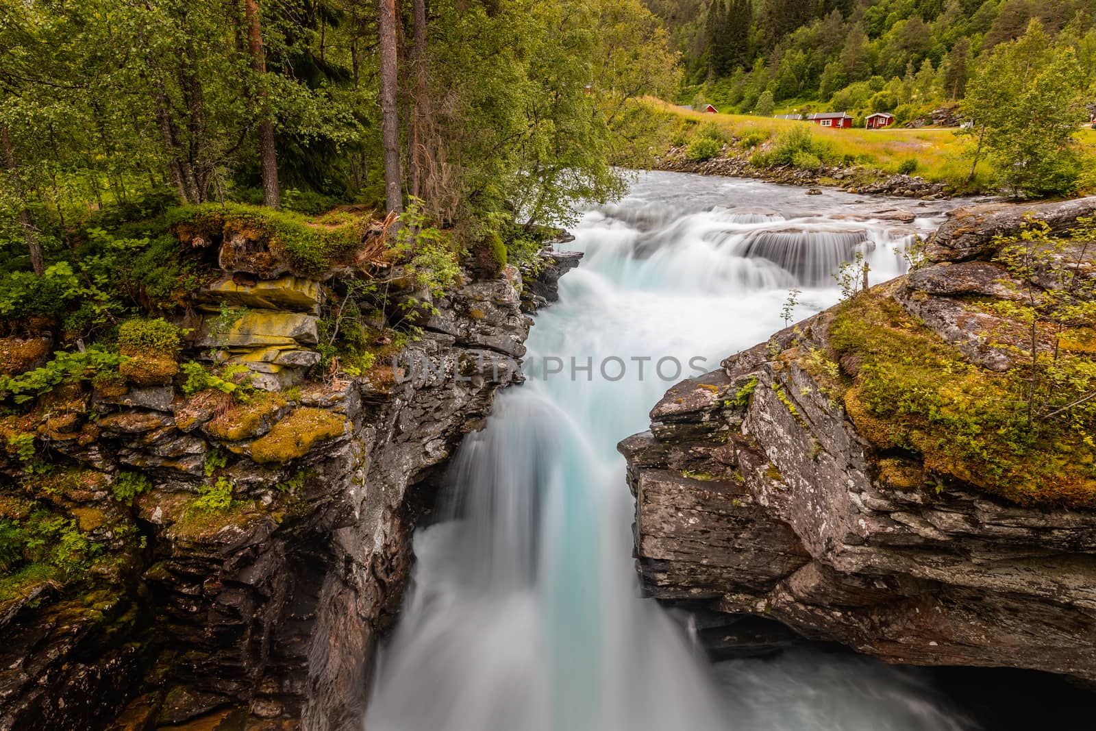 Gudbrandsjuvet ravine and Valldola river running through with waterfall, Valldal, Norway