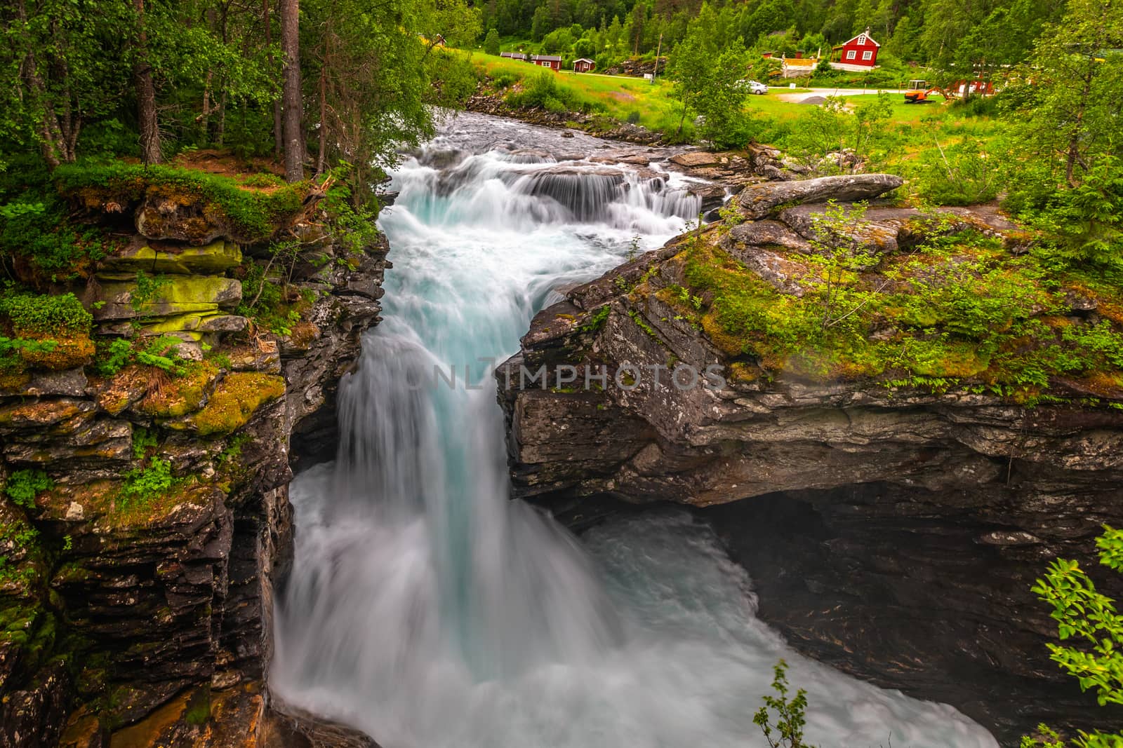 Gudbrandsjuvet ravine and Valldola river running through with waterfall, Valldal, Norway