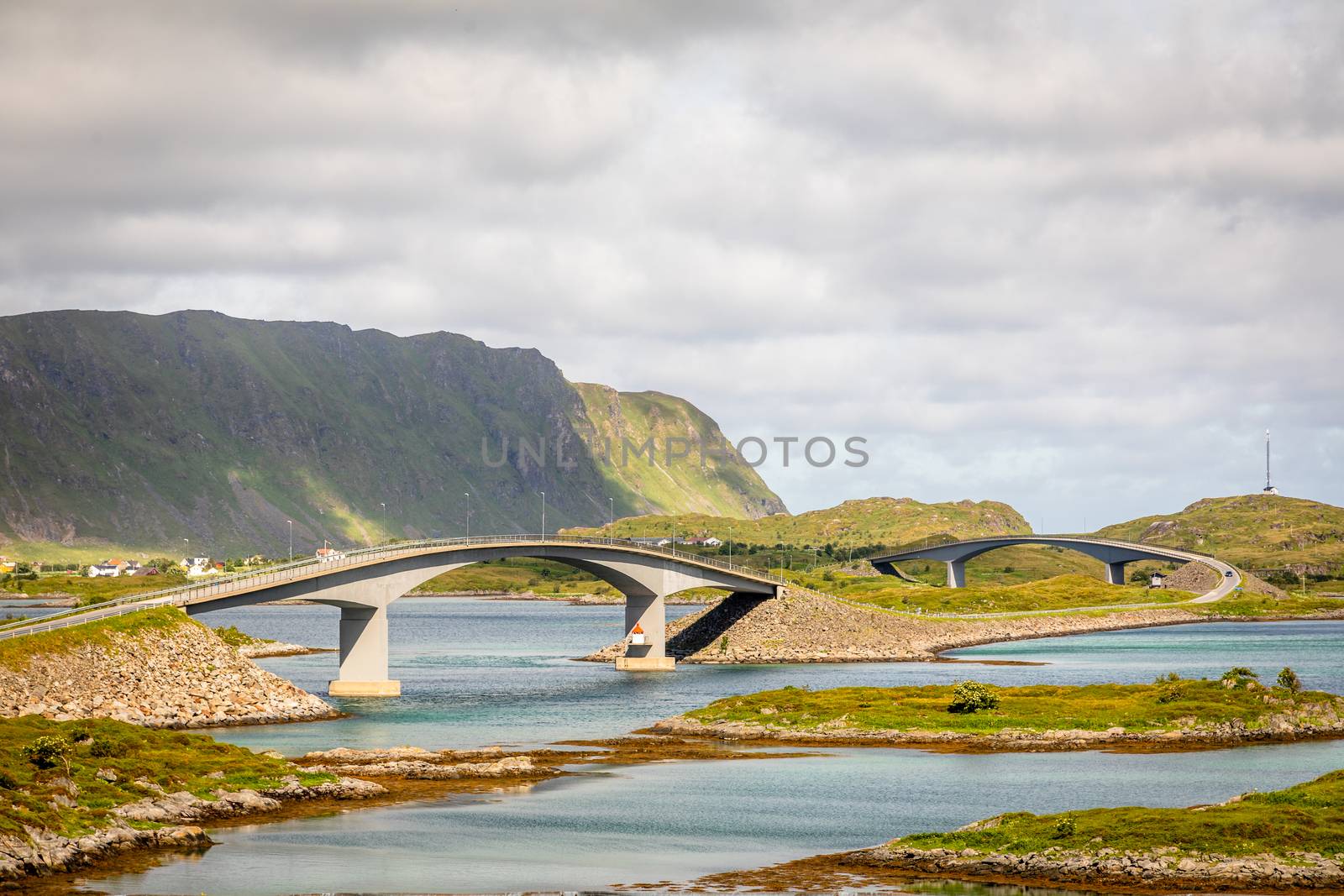 Twisted highway road with Freedvang bridges at the fjord, Lofoten island, Flakstad Municipality Nordland county, Norway