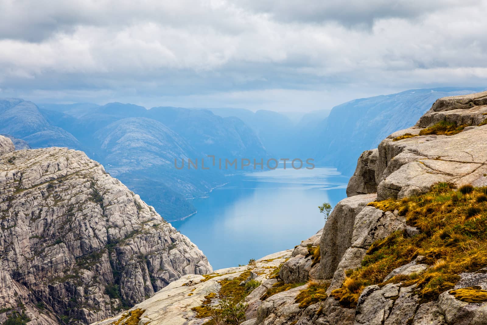 Mountain view to the long narrow norwegian fjord, Lysefjord, Prekestolen hiking trail, Forsand, Rogaland county, Norway