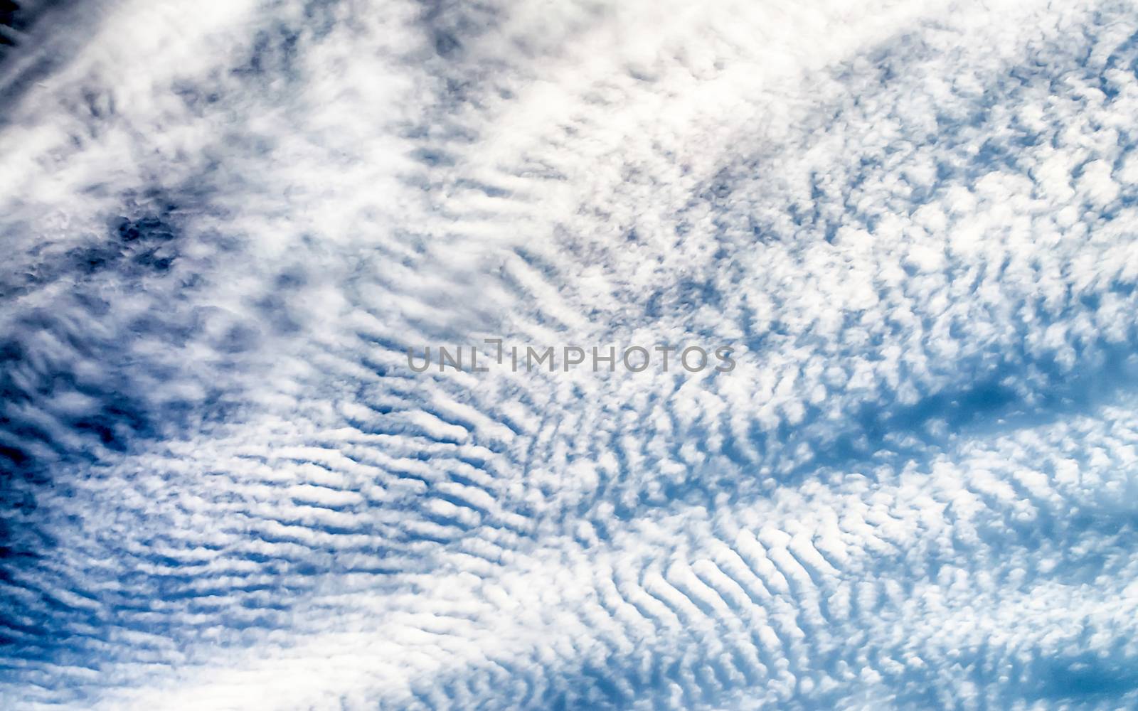 Blue Sky with Stripes Clouds Texture with copy space, may use as background