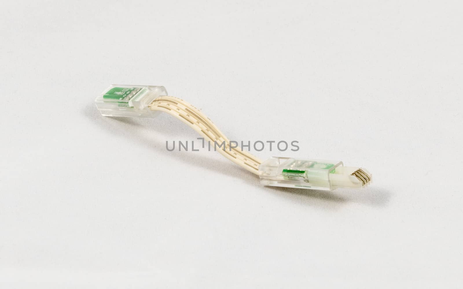 Electronic connector for a led light system, isolated on white background