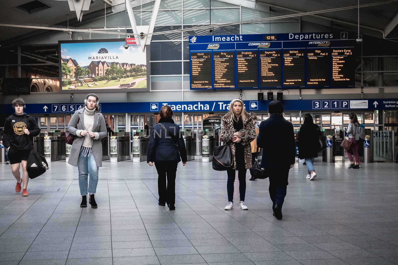 Passengers walking in Connolly DART train station in Dublin by AtlanticEUROSTOXX