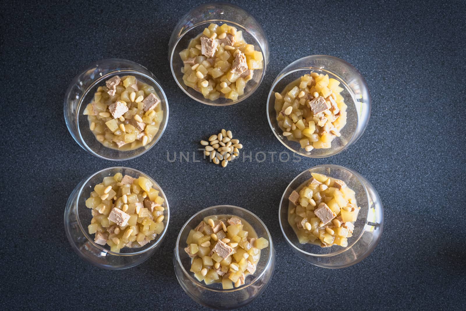 Verrine of pear foie gras and pine nuts in French cuisine