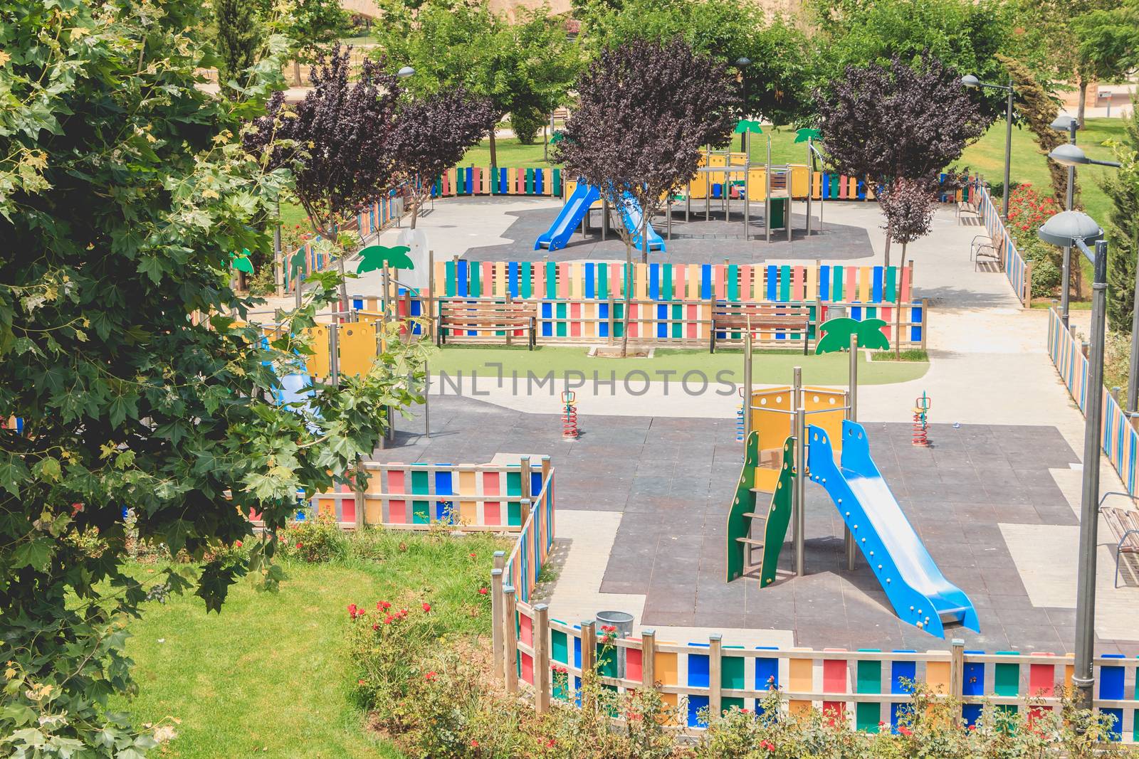 Valencia, Spain - June 16, 2017: view of a children's park with its games and slides in the city center on a summer day