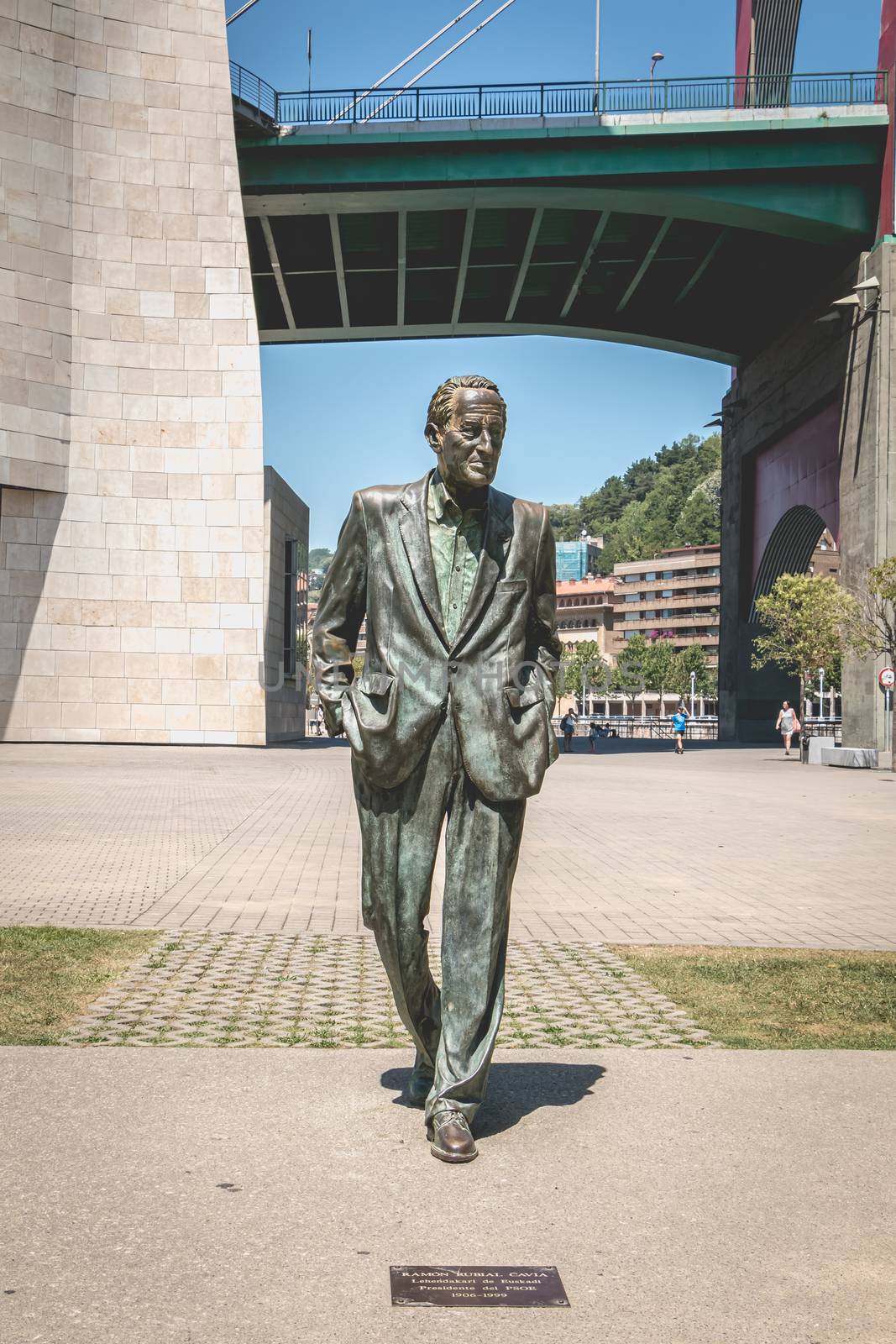 Bilbao, Spain - July 19, 2017: Monument of the socialist leader Ramon Rubial Cavia by Casto Solano, In front of the Guggenheim museum on a summer day