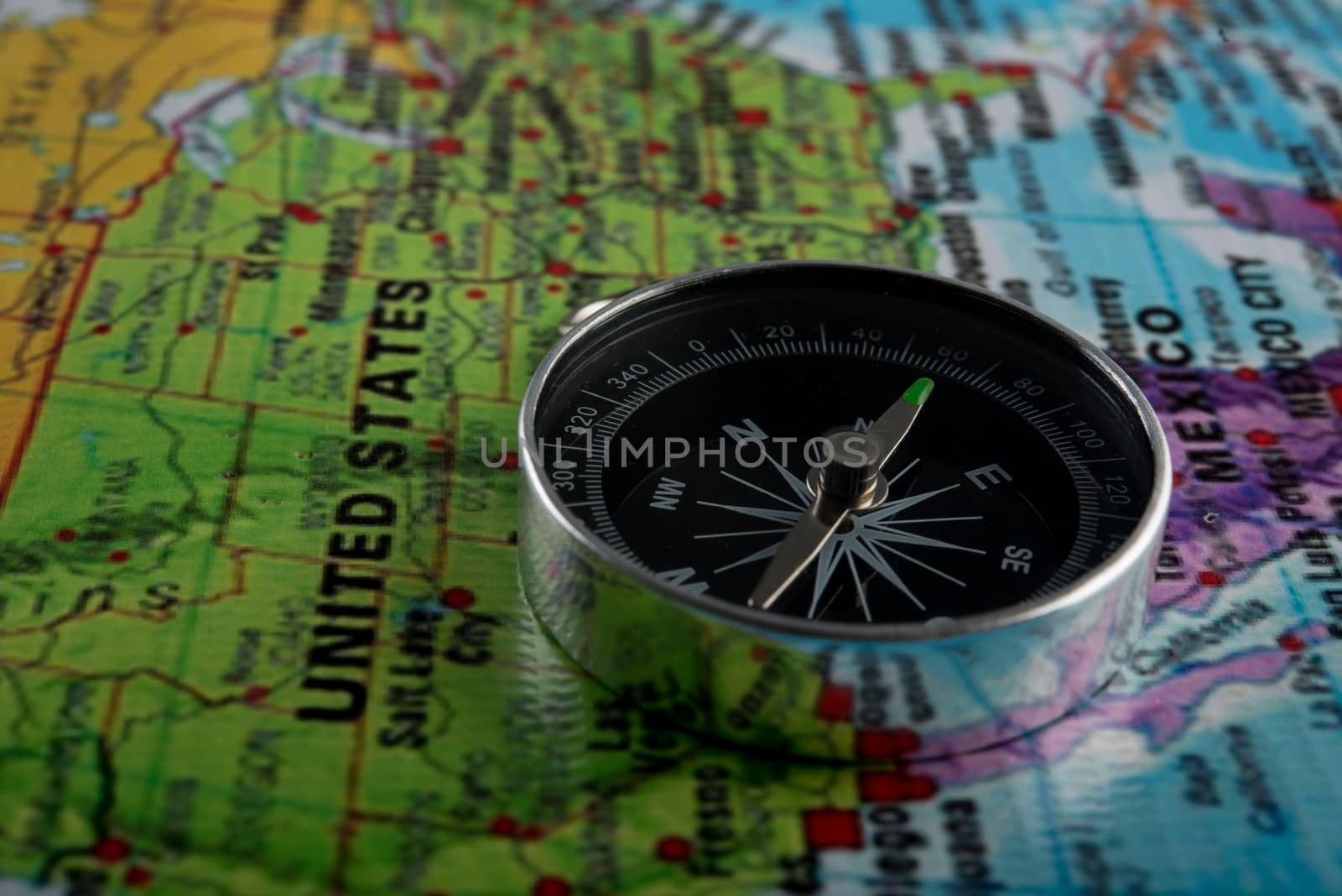 Compass with map background. Travel concept.