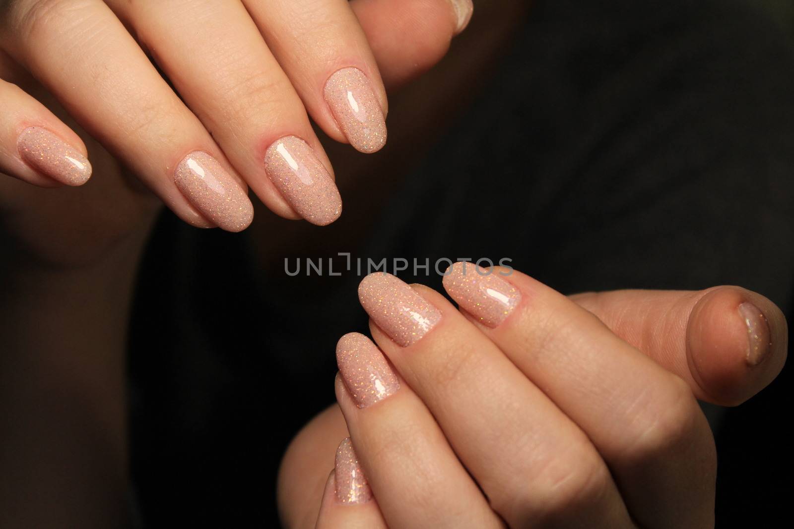 Beautiful woman's nails with beautiful christmas manicure studio