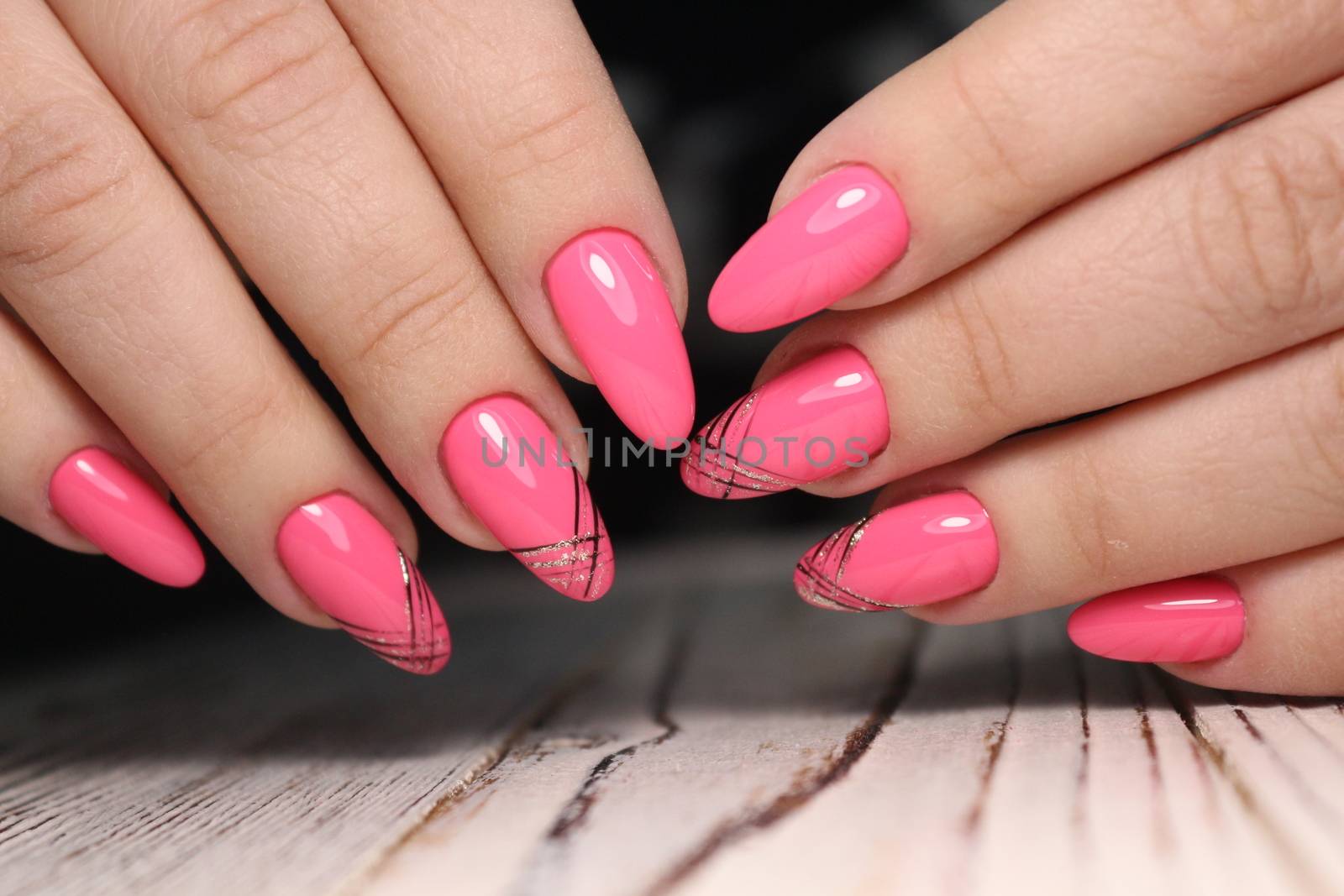 manicure with long nails on a trendy texture background