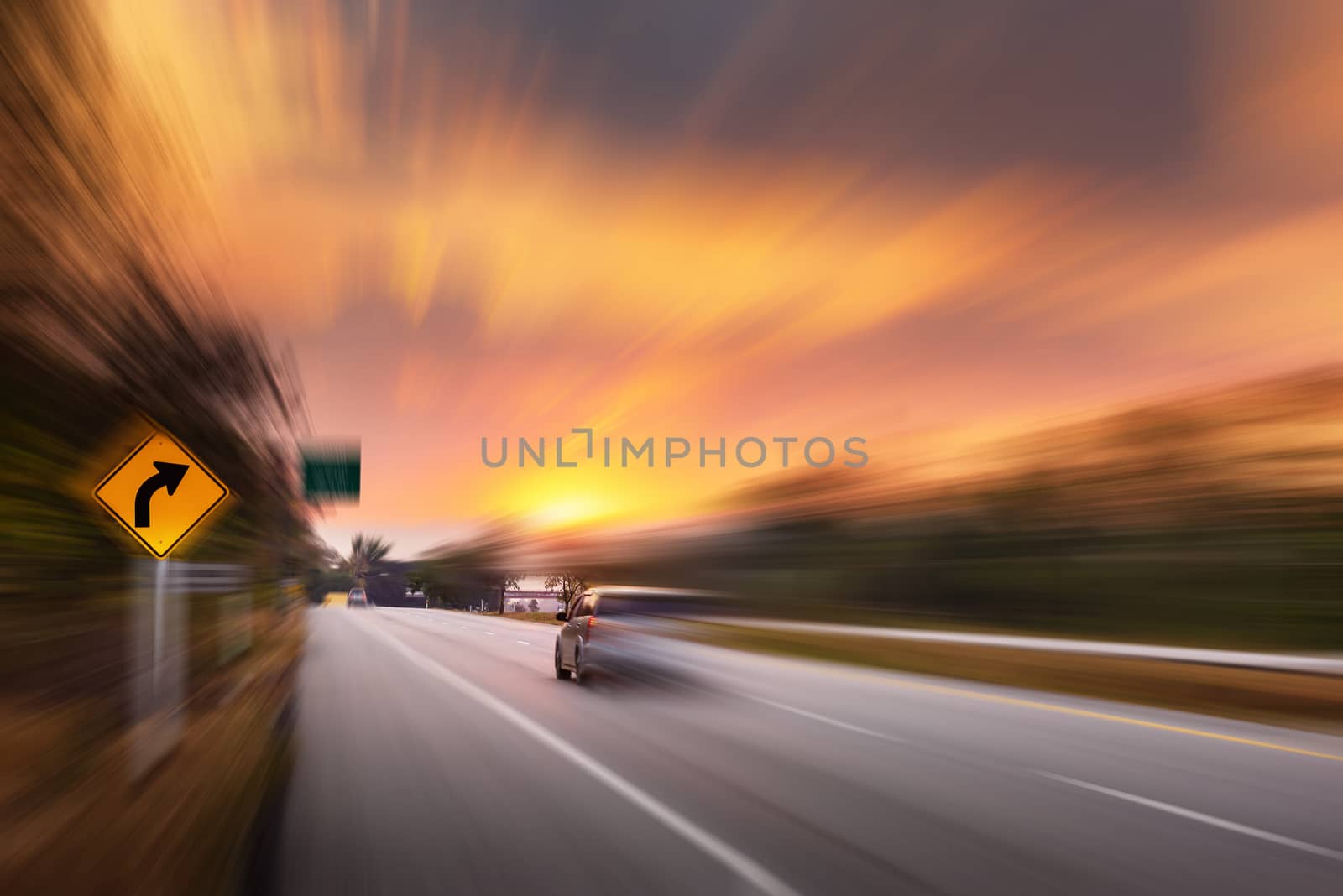 Motion Movement of Vehicle Car in Transportation Mode on Traffic Road, Motions Blur of Automotive While Speed Moving on Motorway During Sunset Scene. Transport Car Driving and Safety concept