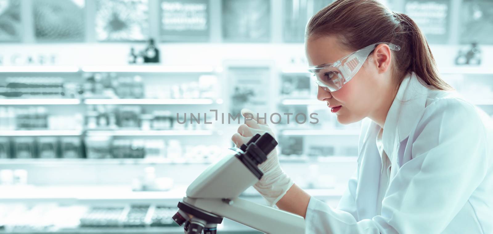 Medical Scientist Researcher Using Microscope in Laboratory,  Medicine Specialist Studying and Experiment Anti Virus Pharmaceutical With Microscopic. Lab Research and Technology Health Care Concept. by MahaHeang245789
