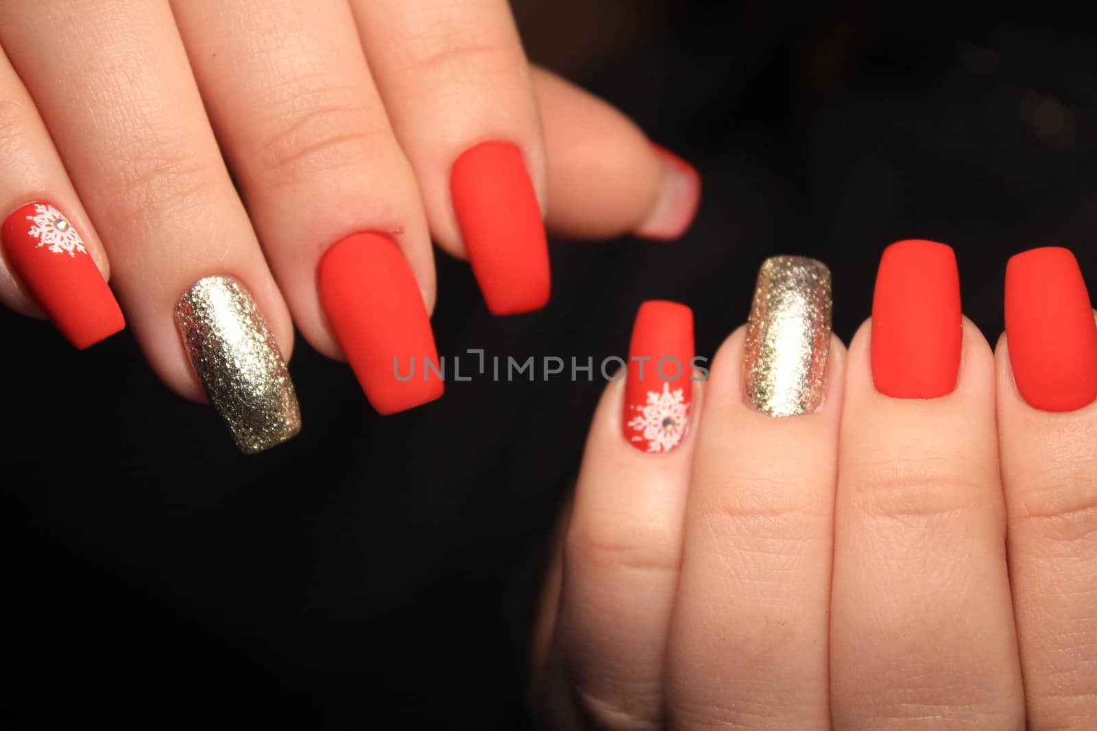 Abstract New Year design on women's nails. Isolated.