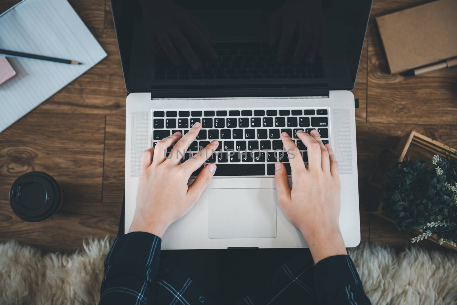 Work From Home Lifestyle and Business Online, Attractive Woman Hands is Typing on Keyboard Laptop While Working at Home. Business Freelance Person Using Computer Laptop at Her Home Workplace