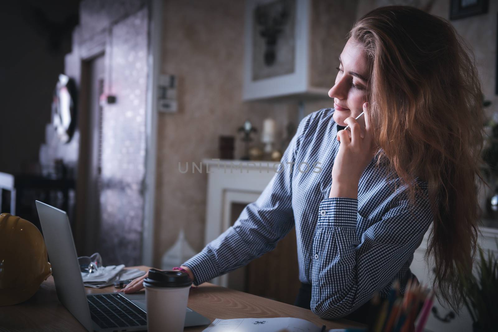 Work From Home Lifestyle and Business Online, Attractive Woman Hands is Calling on Mobile Phone While Working at Home. Business Freelance Person Using Computer Laptop at Her Home Workplace, New Normal by MahaHeang245789