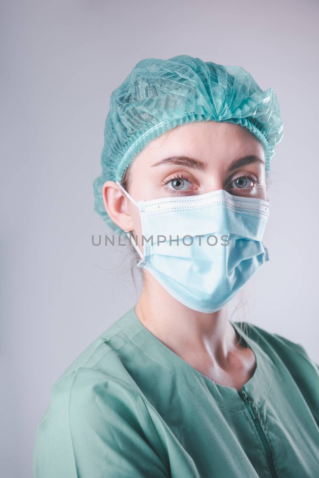 Medical Surgical Doctor and Health Care, Portrait of Surgeon Doctor in PPE Equipment on Isolated Background. Medicine Female Doctors Wearing Face Mask and Cap for Patients Surgery Work. Medic Hospital by MahaHeang245789