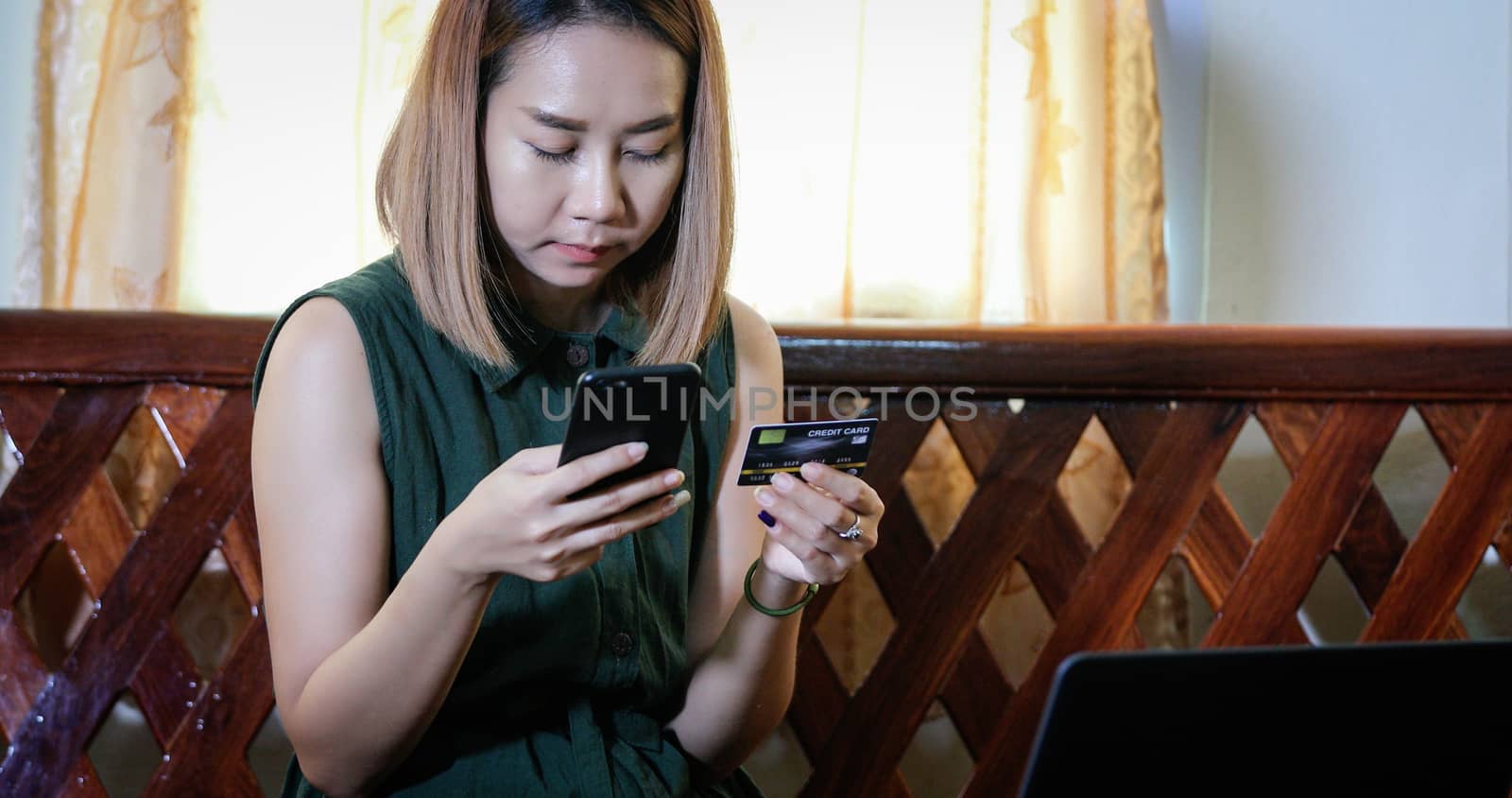 woman asian using smartphone and credit card shopping online