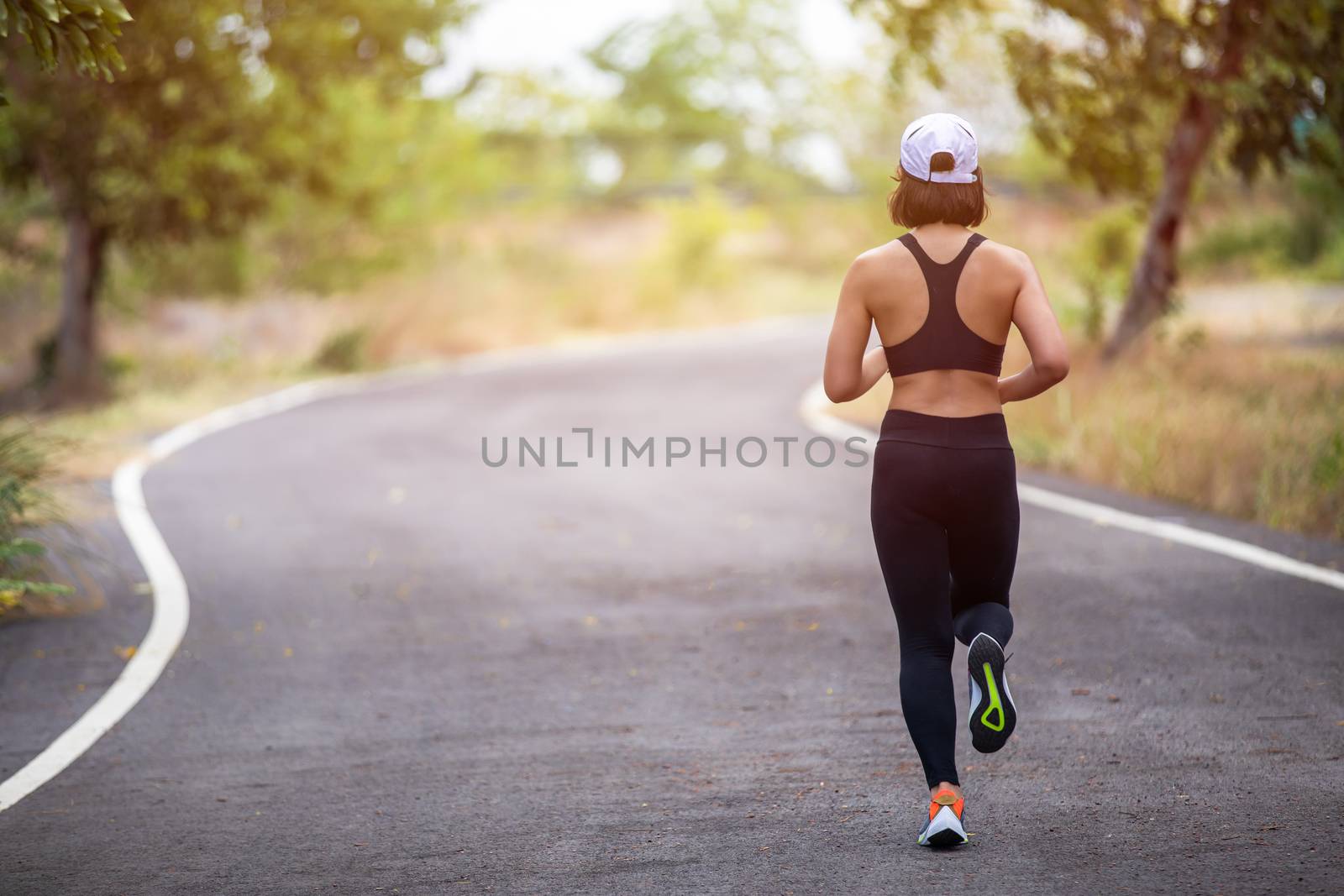 Asian women Running and jogging during outdoor on park