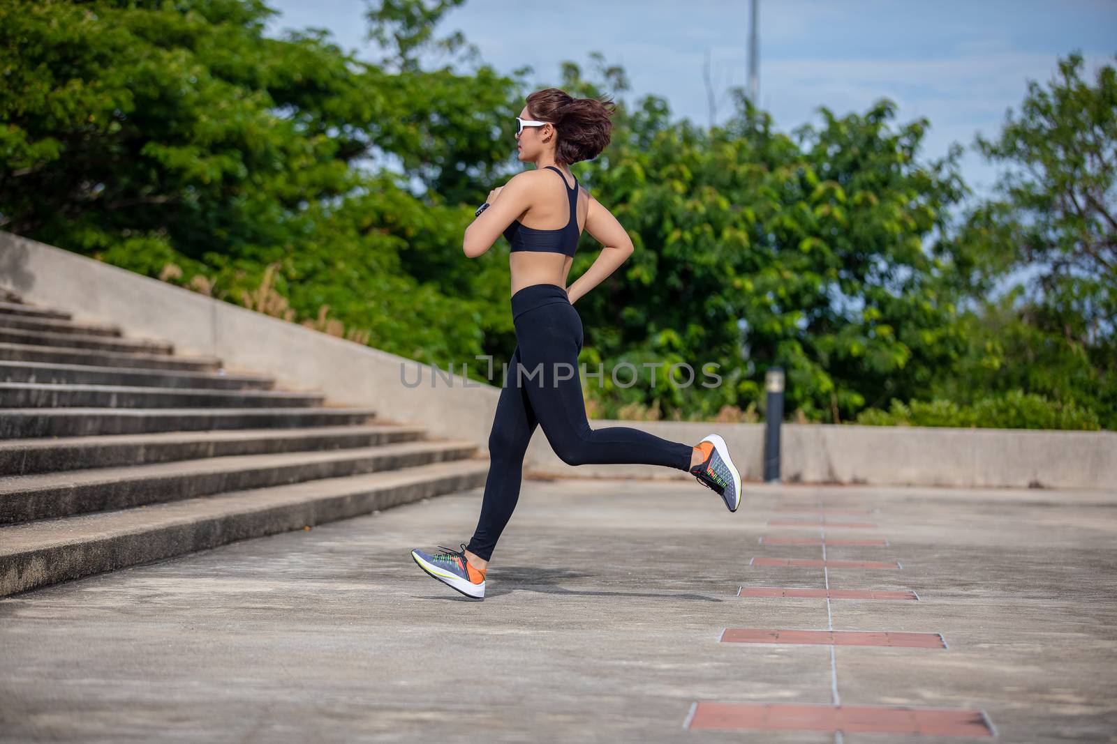 Asian women Running and jogging during outdoor on city run