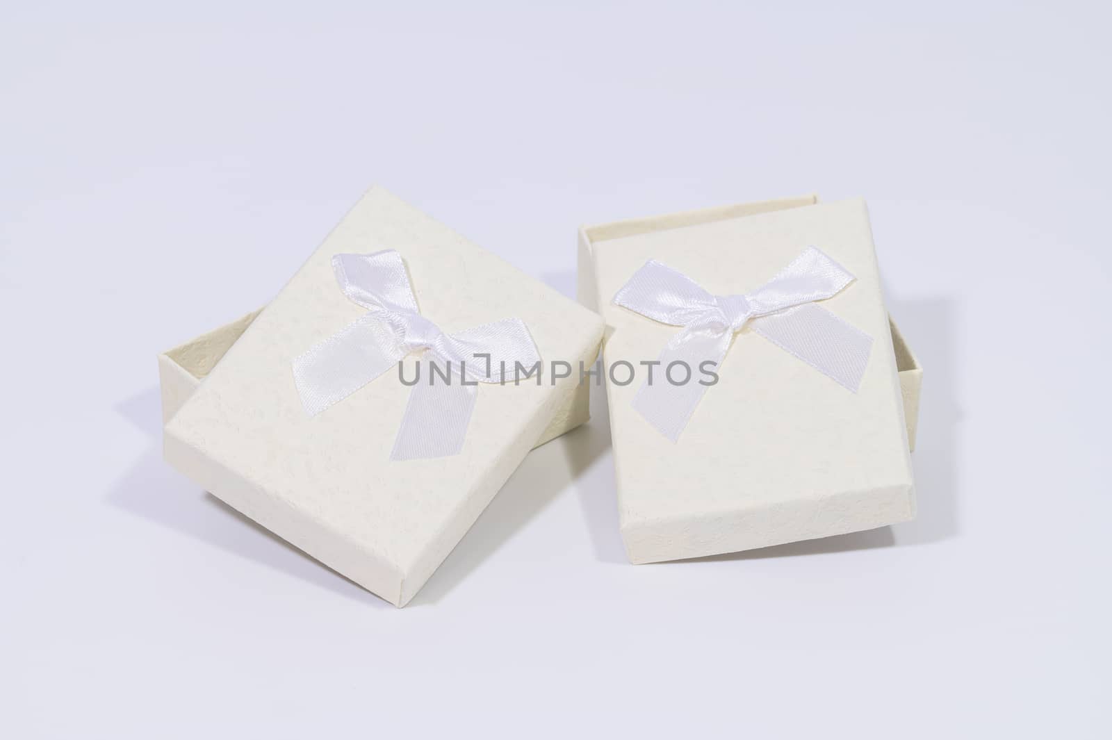 Creamy white gift box In the white background