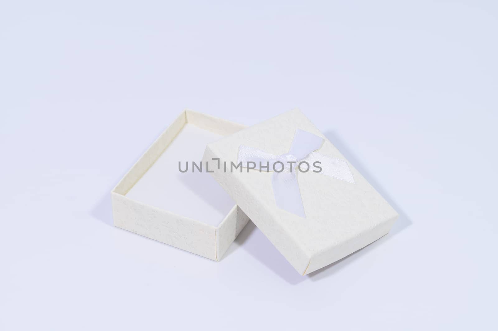 Creamy white gift box In the white background