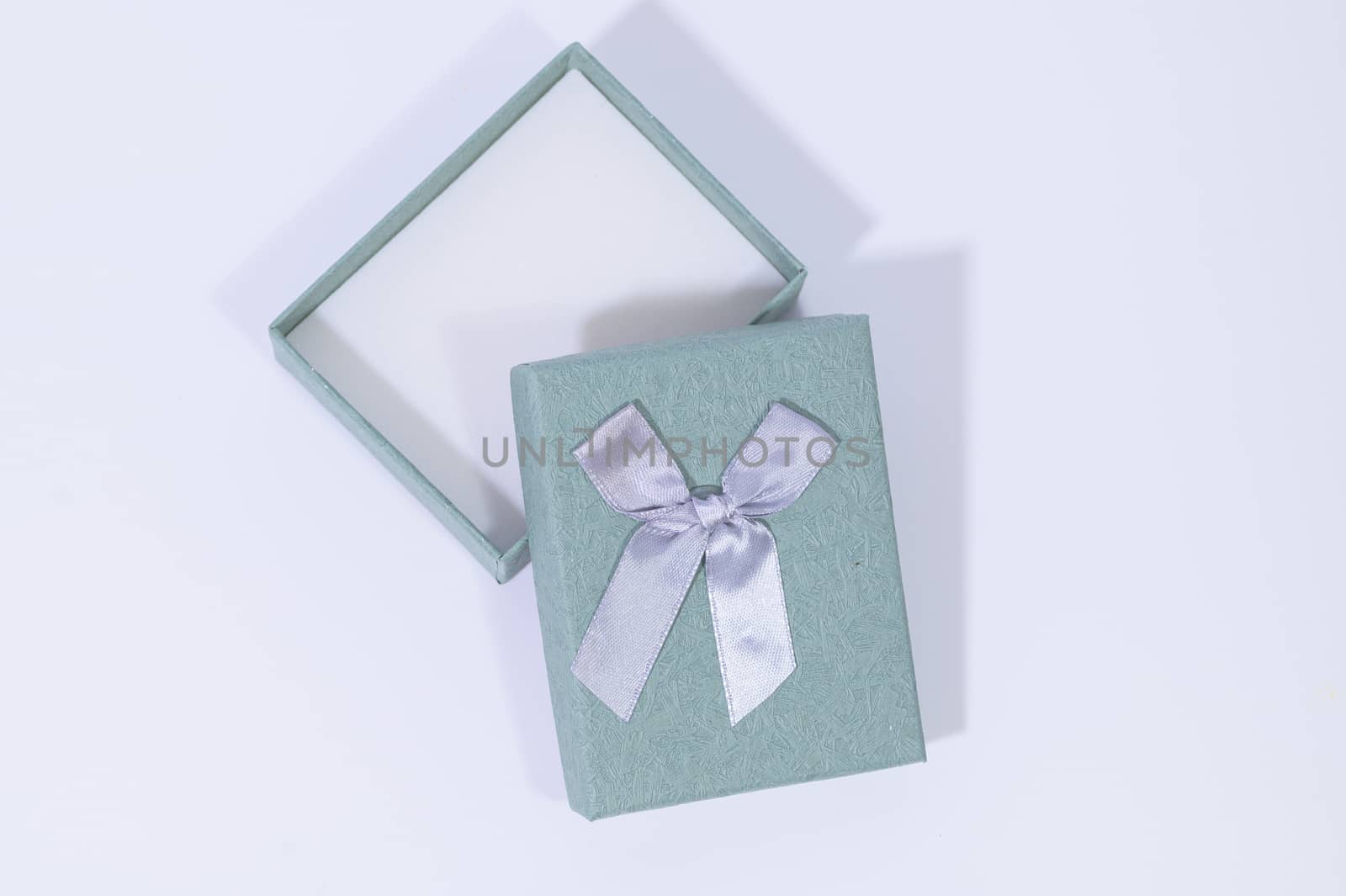 Blue-green gift box In the white background