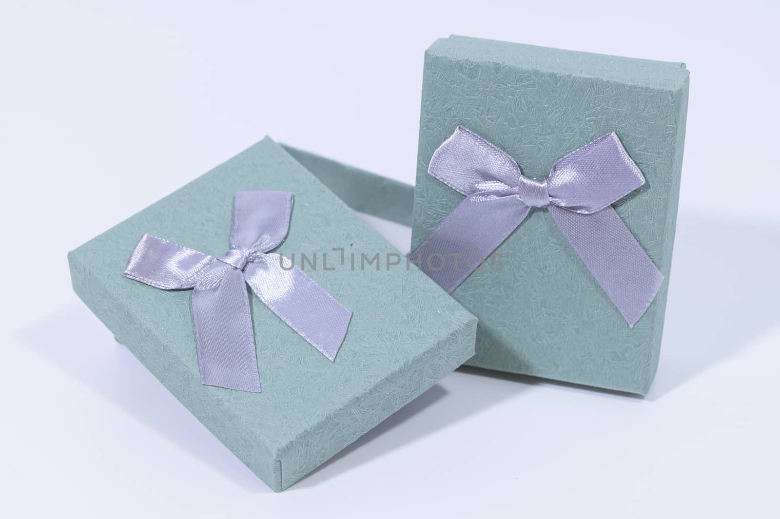 Blue-green gift box In the white background